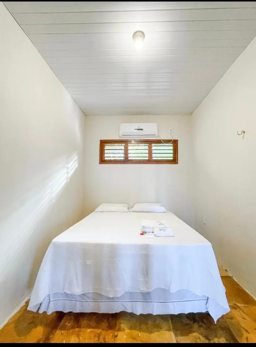 Bed in Pousada Estrela Peroba