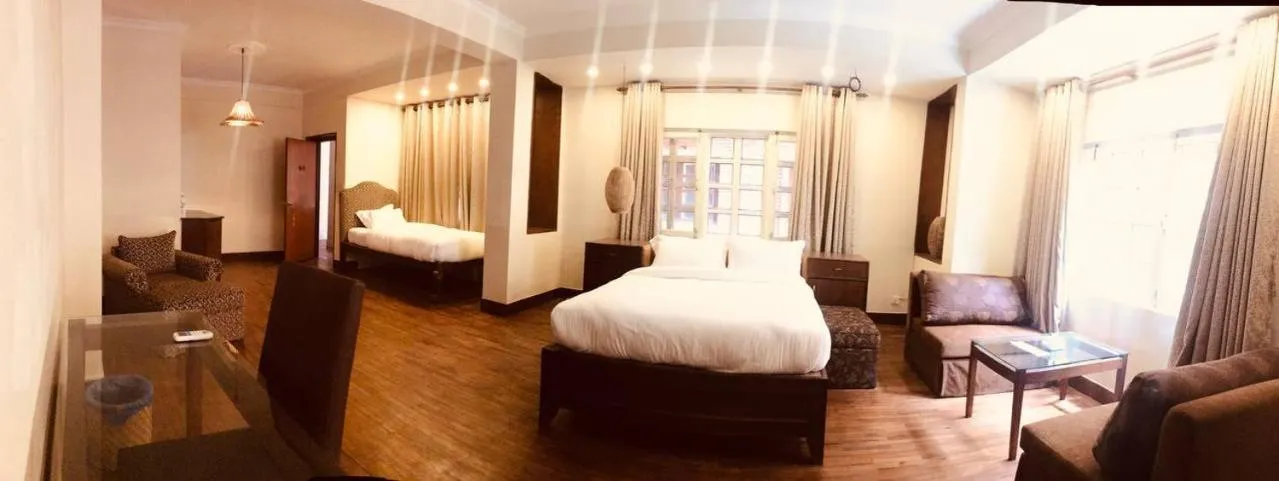 Bed in Courtyard Pujan Hotel Kathmandu - Thamel