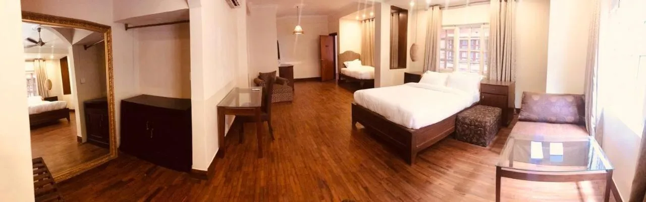 Bed in Courtyard Pujan Hotel Kathmandu - Thamel