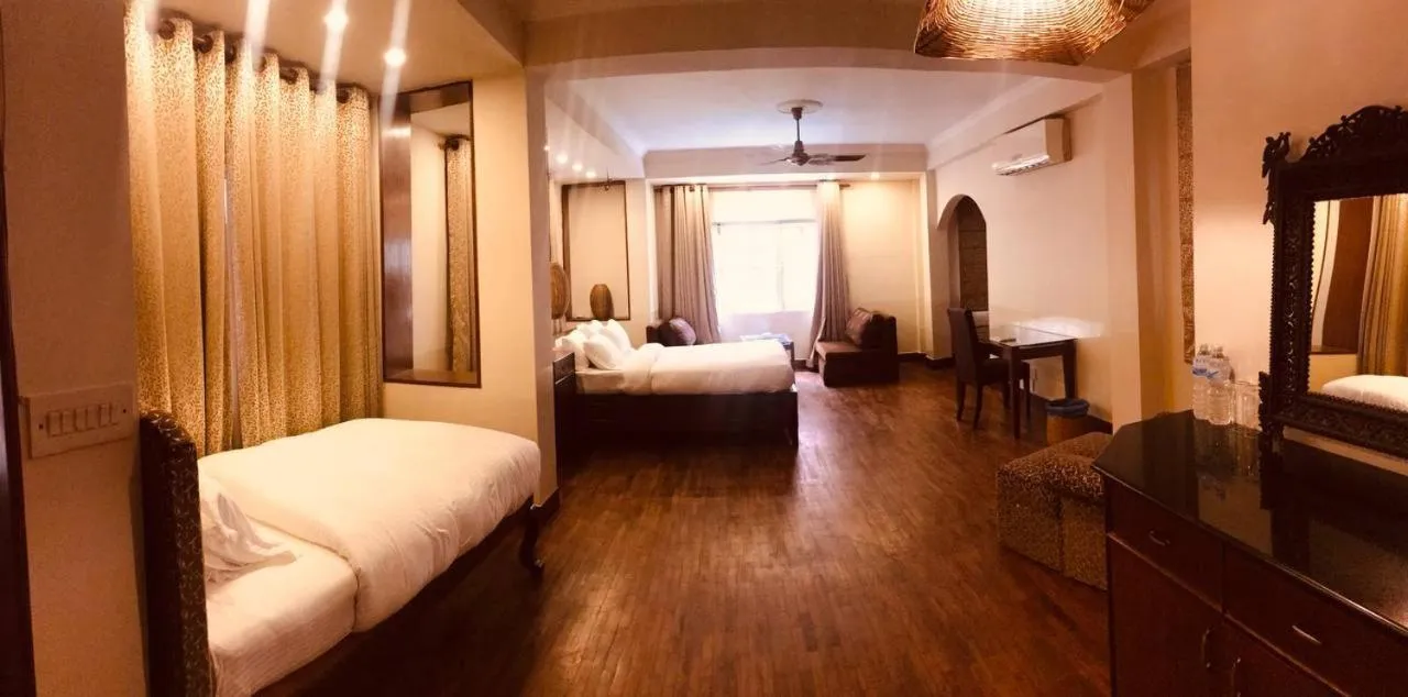 Bed in Courtyard Pujan Hotel Kathmandu - Thamel