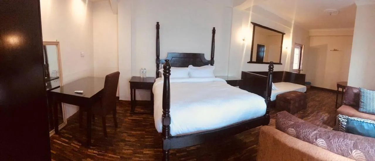 Bed in Courtyard Pujan Hotel Kathmandu - Thamel