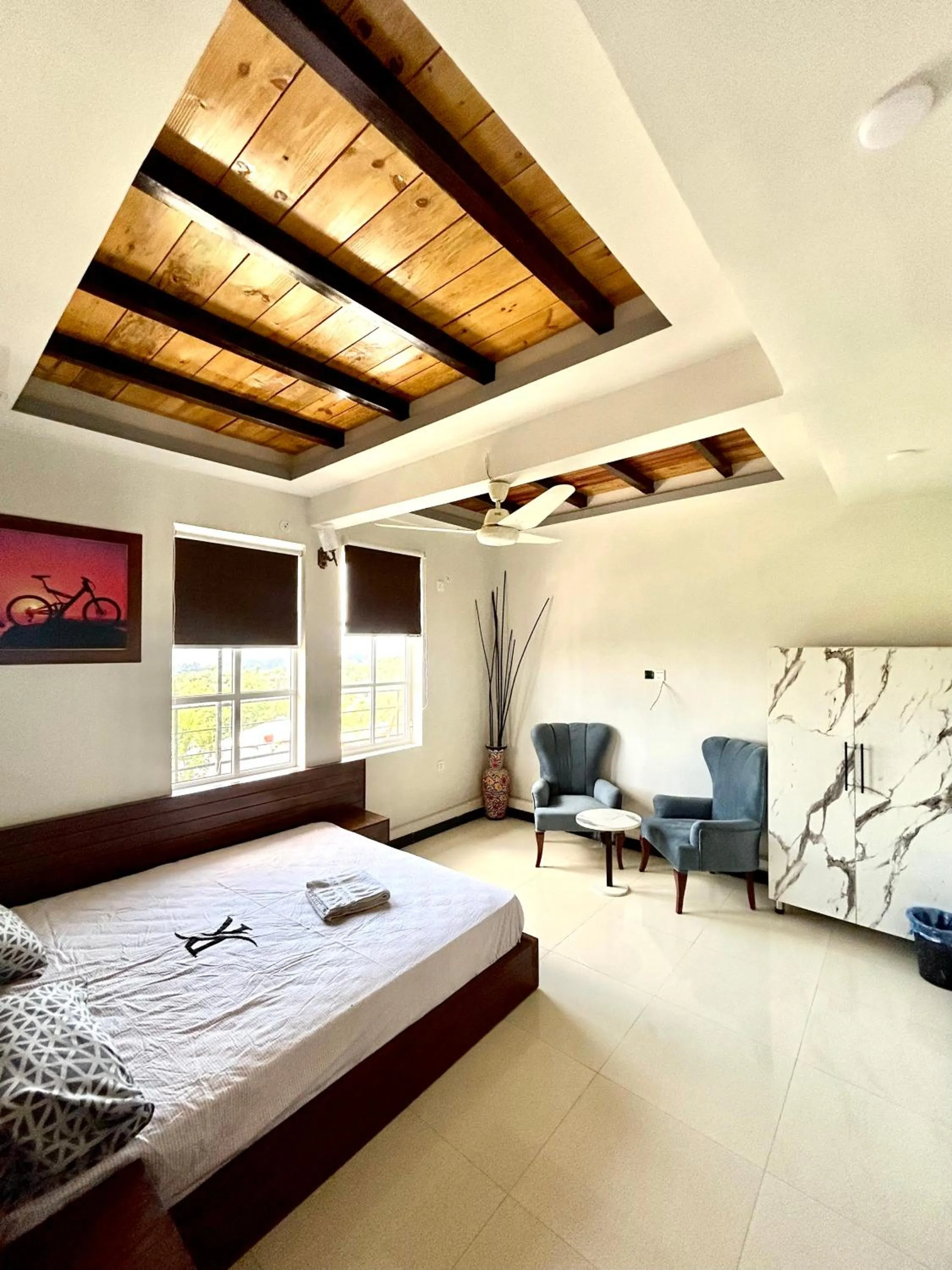 Seating area, Bed in Republika Central Hotel & Resort