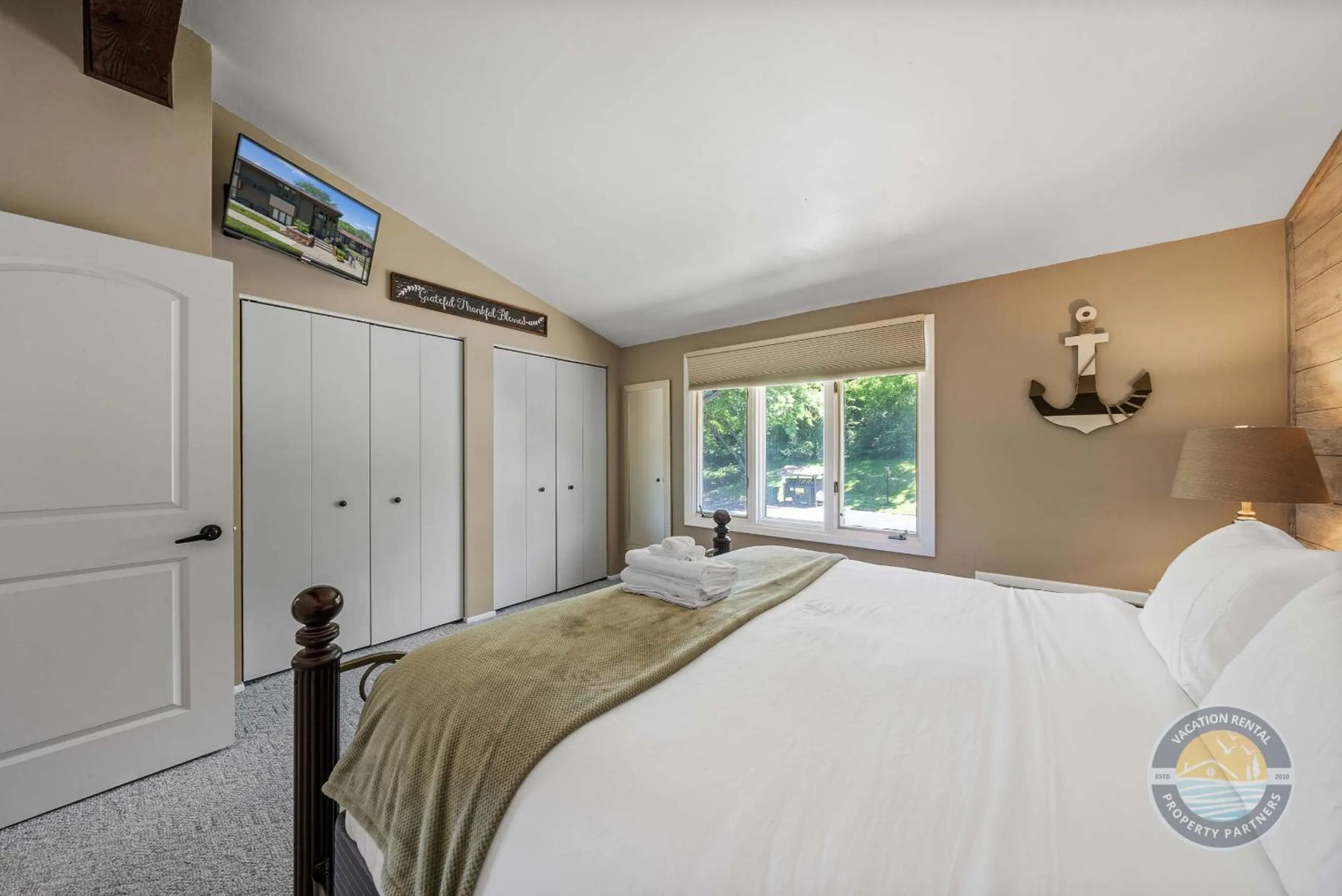 Bed in New Lake Como Condo with Lake Views