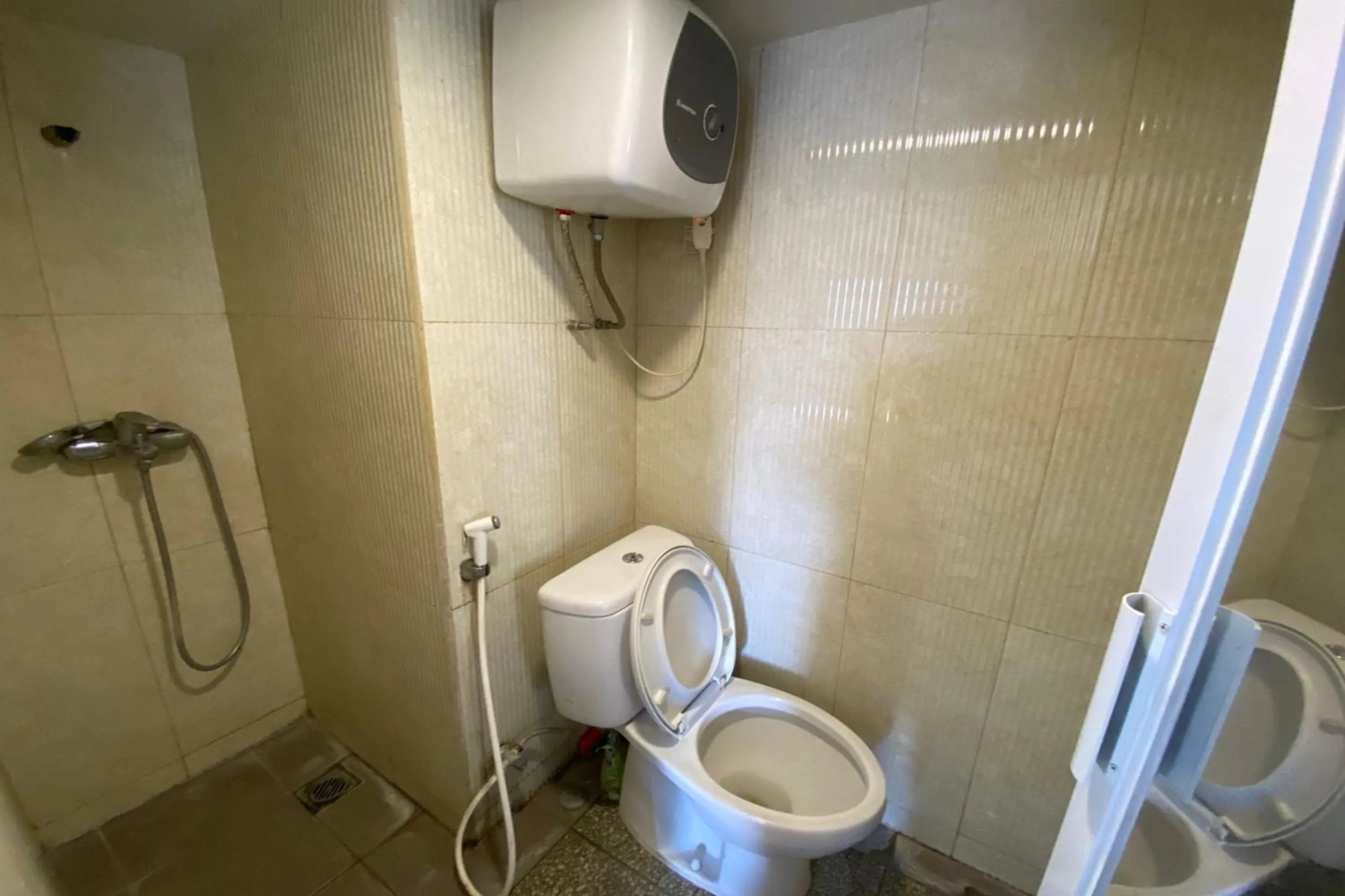 Bathroom in Cozy Room @ Hallo Tidur by Tio