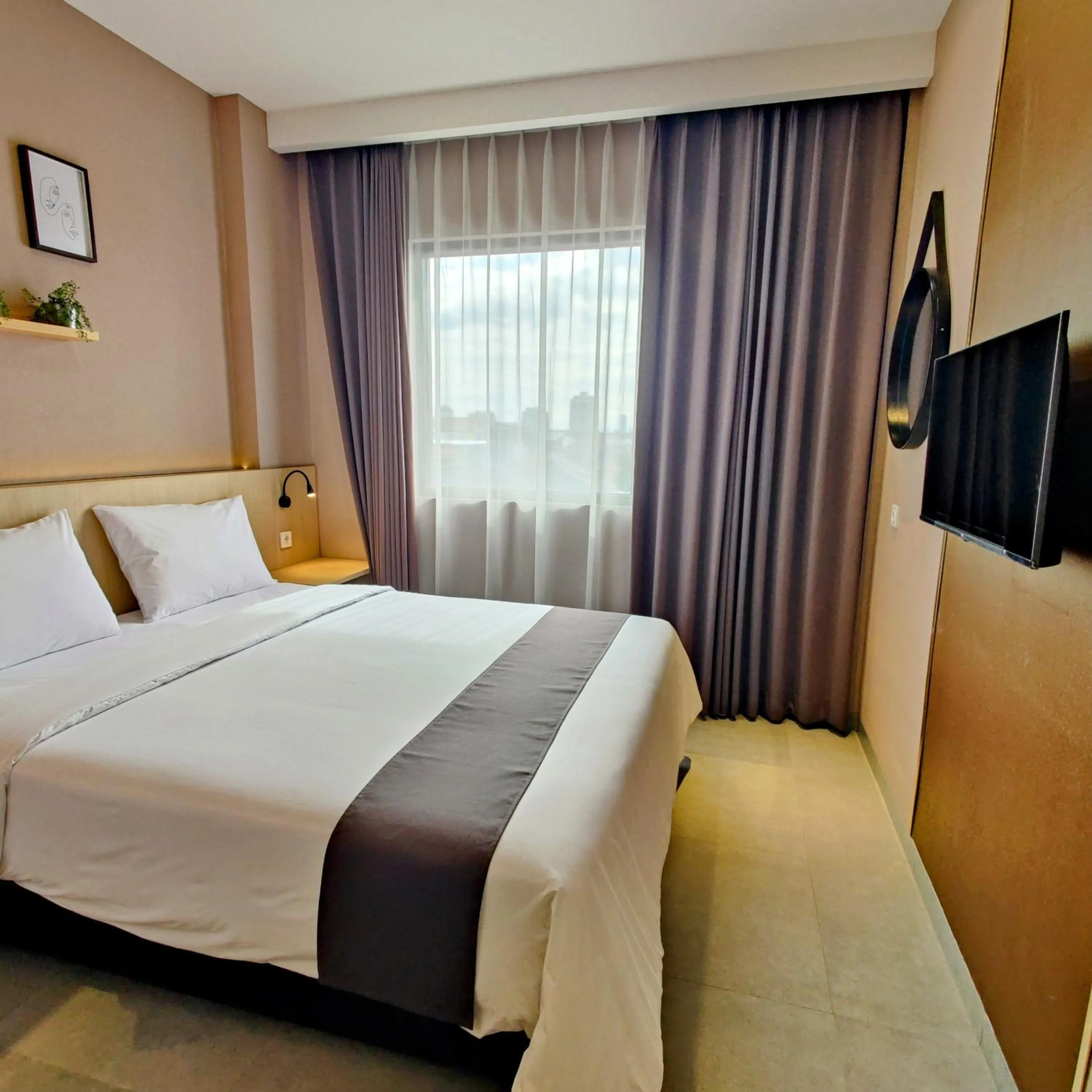 Bed in The Mango Suites by Flat06