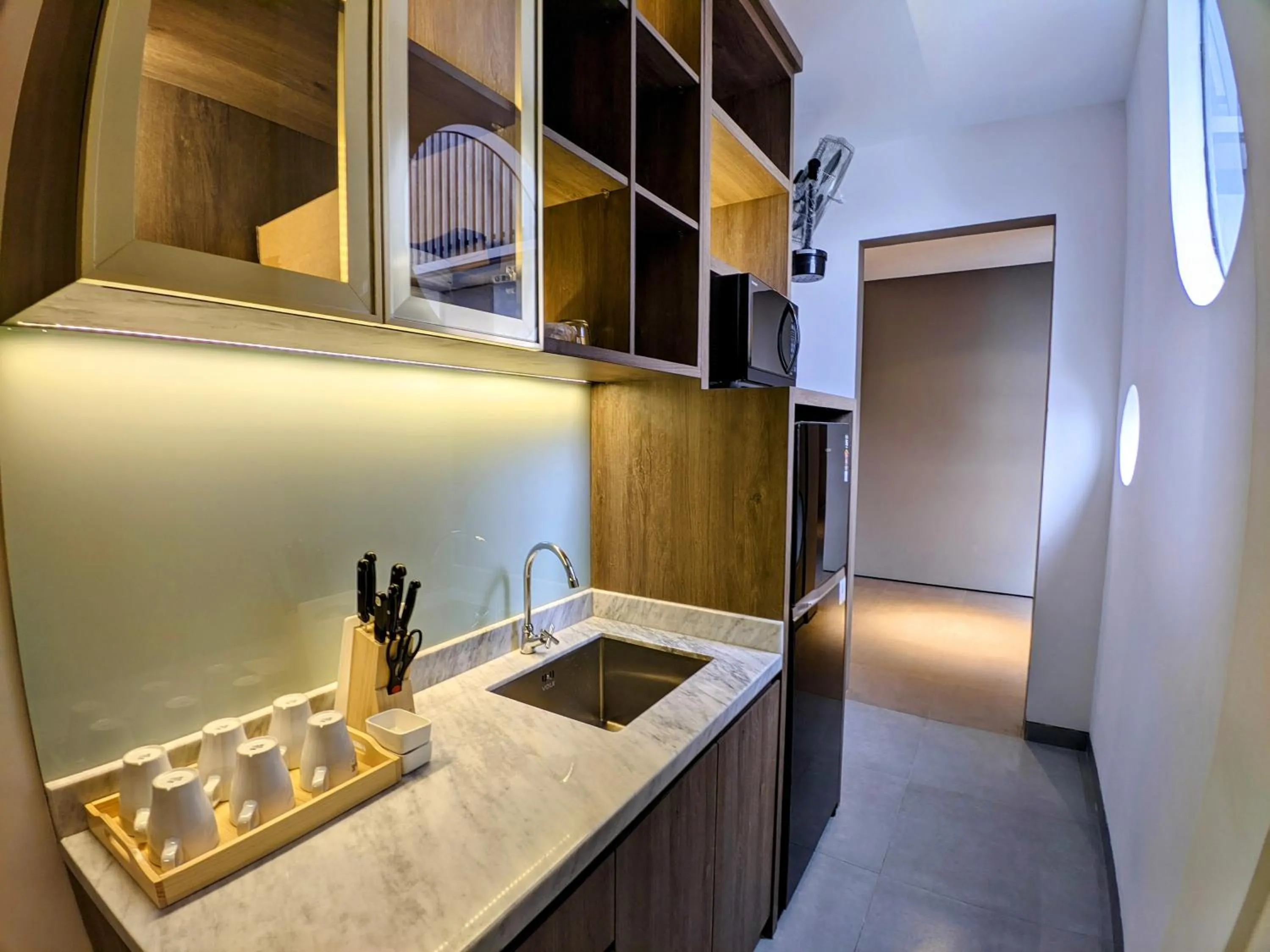 Kitchen or kitchenette in The Mango Suites by Flat06