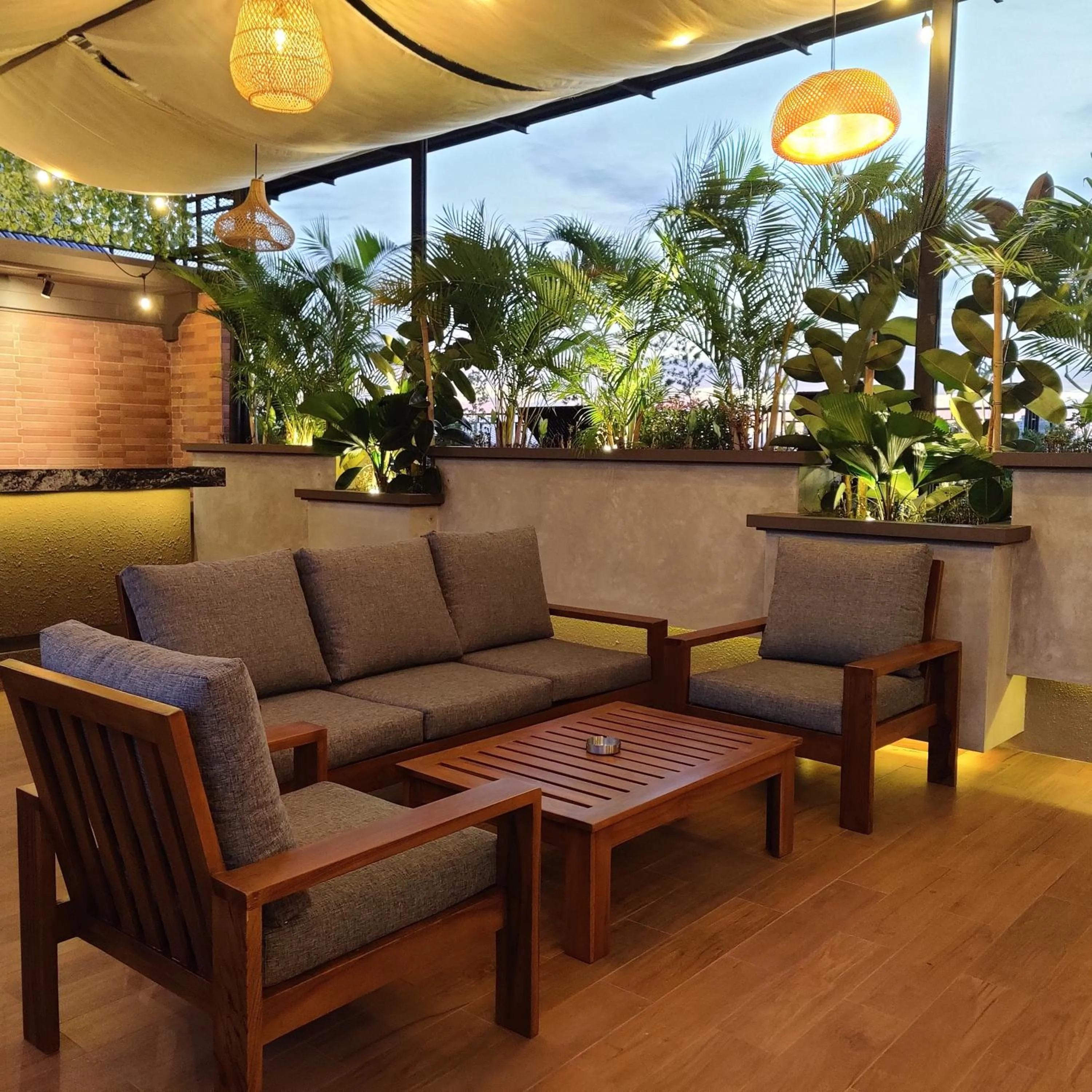 Communal lounge/ TV room in The Mango Suites by Flat06