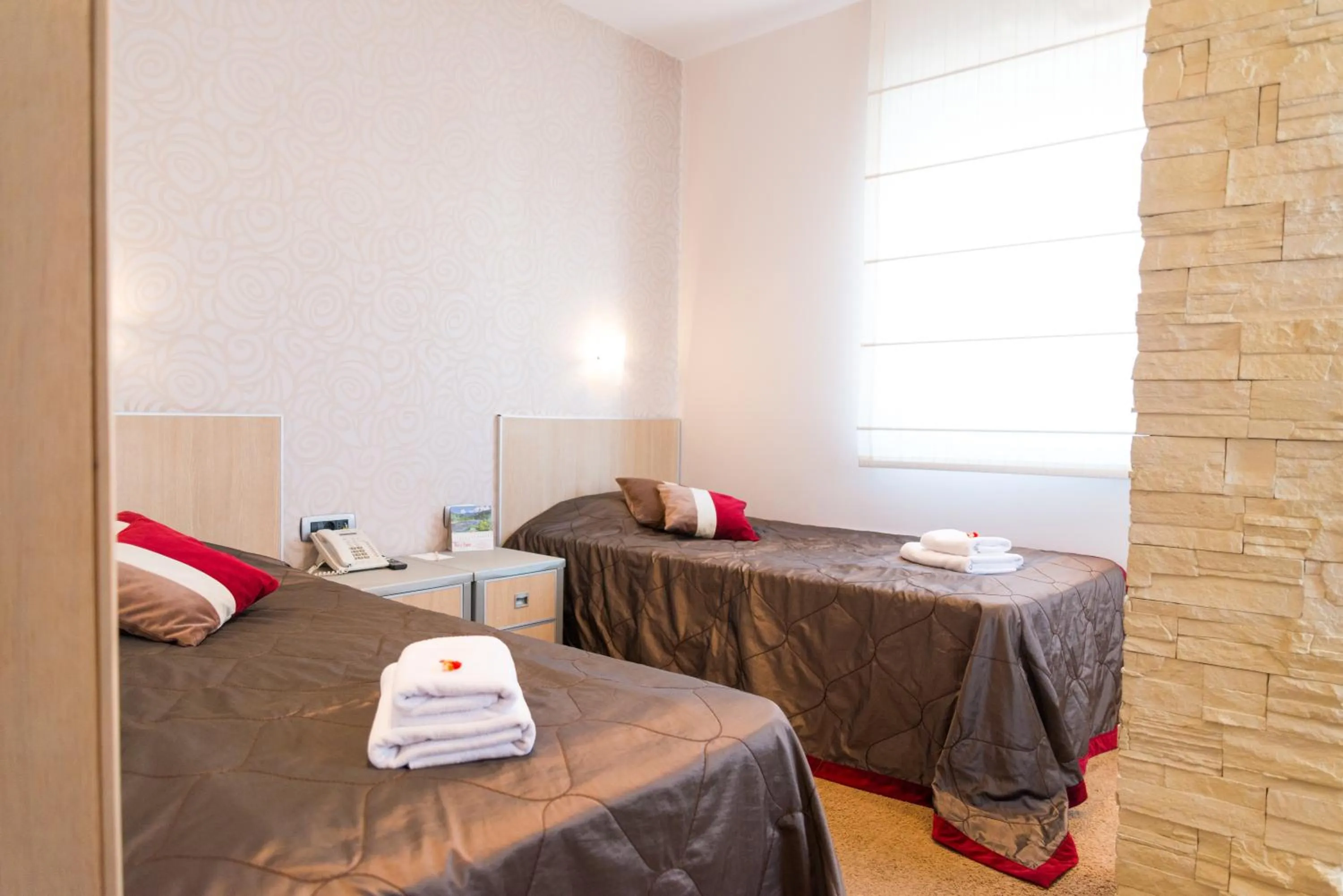 Bed in Garni Hotel Vigor - EV station