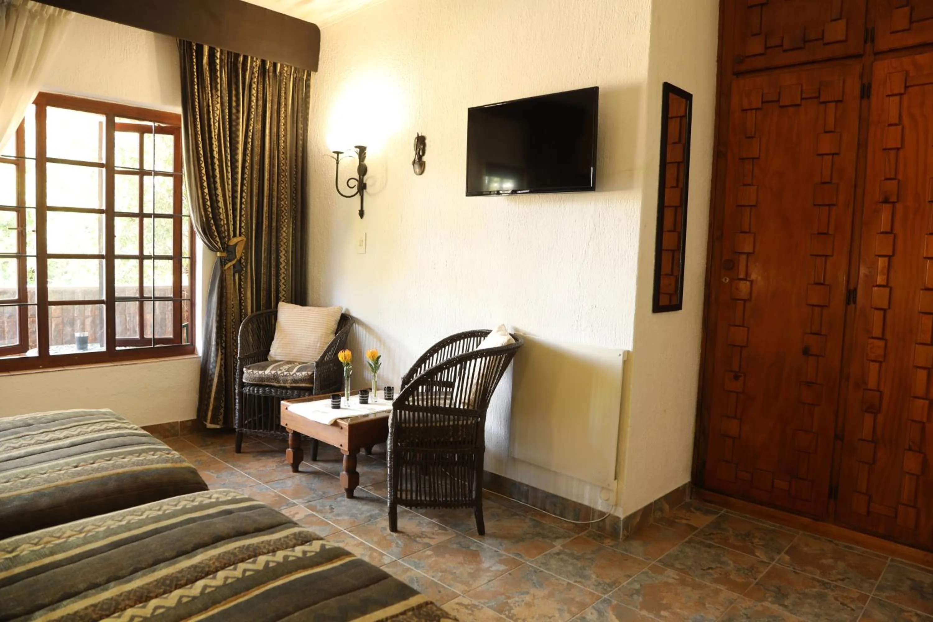 Seating area, Bed in Villa Ticino Guest House