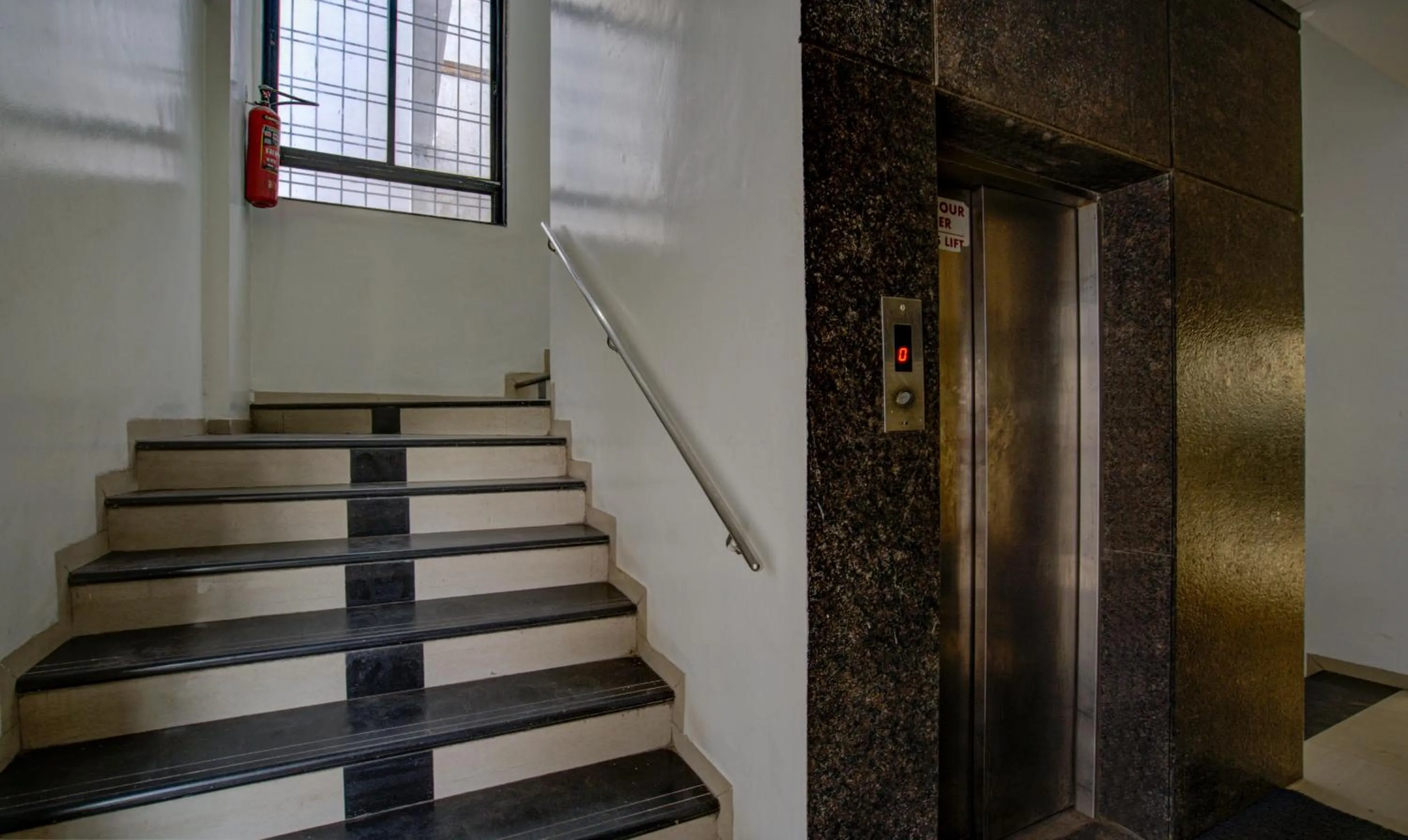 elevator in Treebo Grand Lotus - 3 km from Textile Market