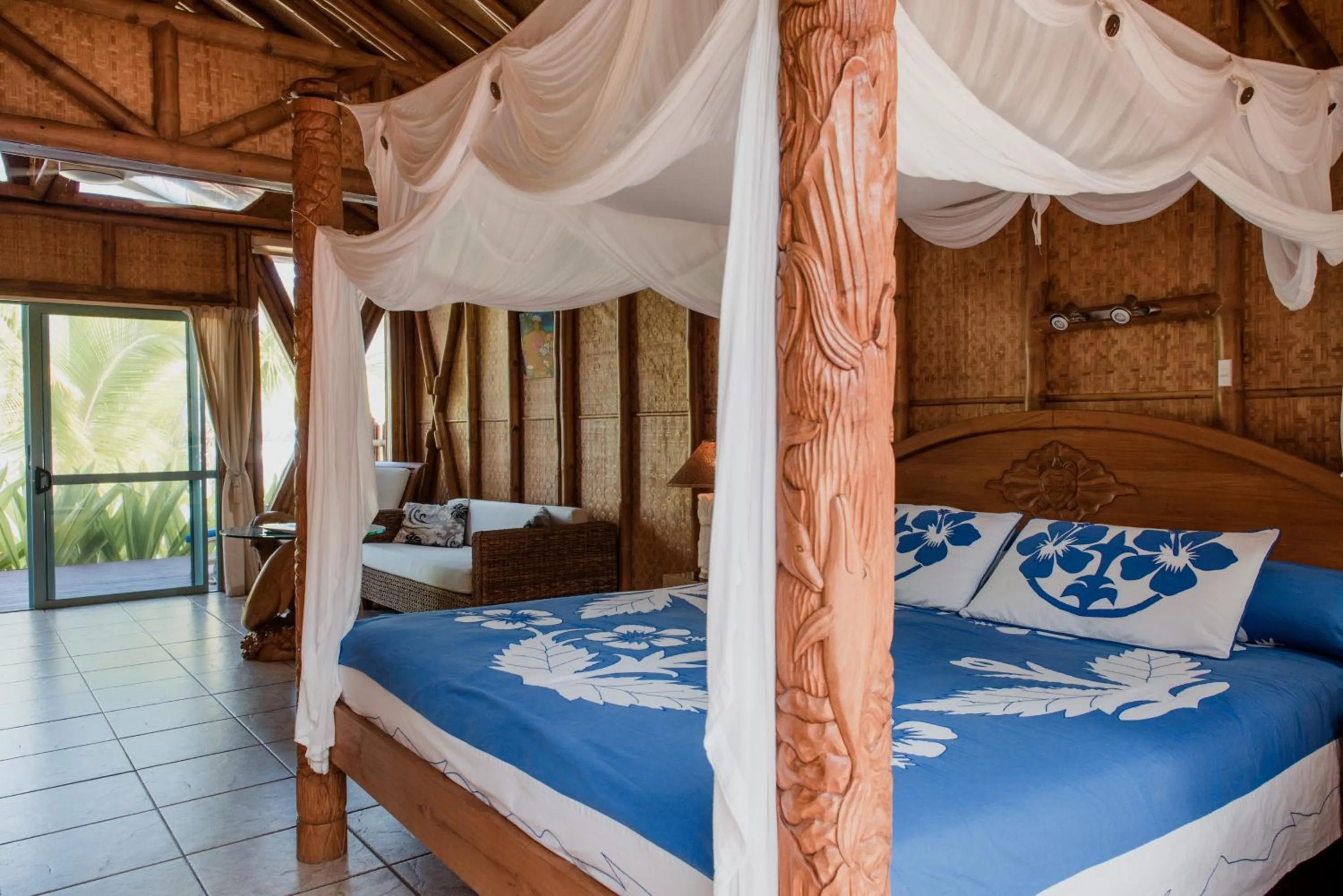 Bed in Magic Reef Bungalows