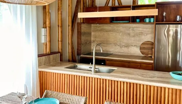 Kitchen or kitchenette in Magic Reef Bungalows