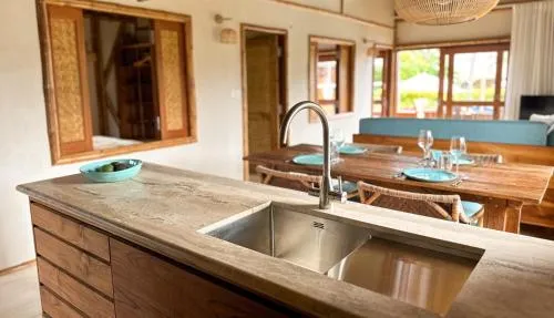 Kitchen or kitchenette in Magic Reef Bungalows