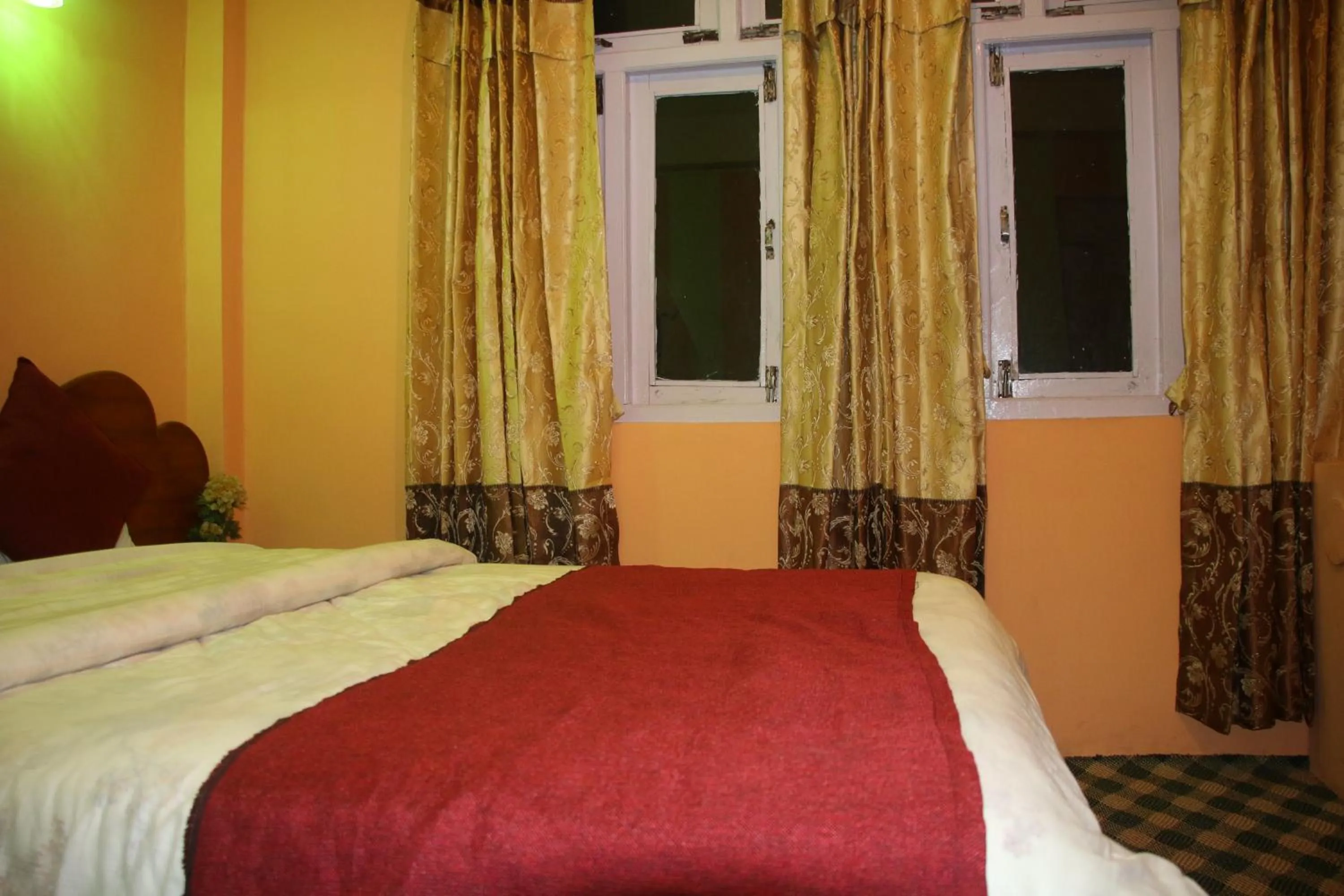 Bed in Hotel Pathibhara