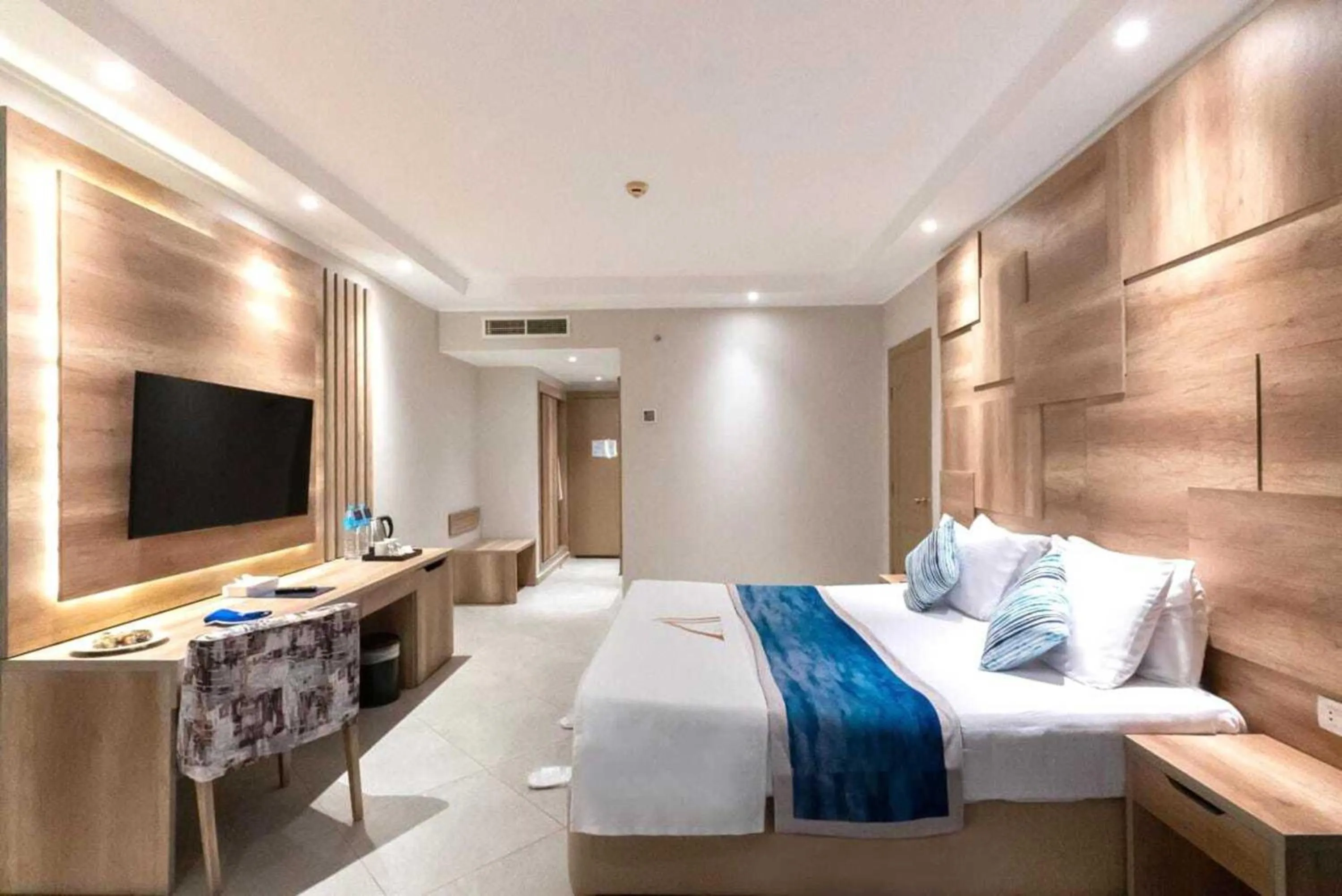 Bed in THE V Luxury Resort Sahl Hasheesh