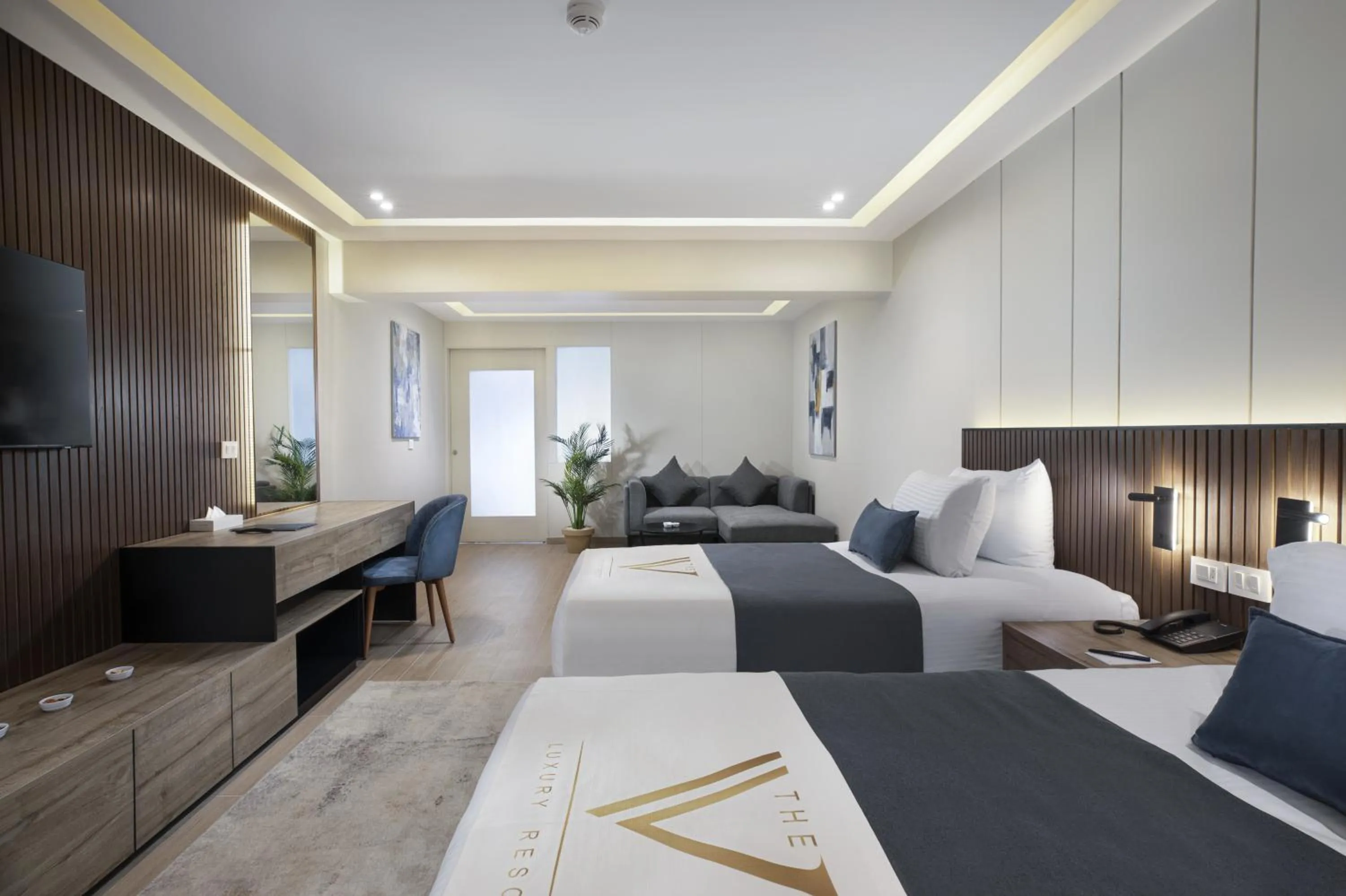 Photo of the whole room, Bed in THE V Luxury Resort Sahl Hasheesh