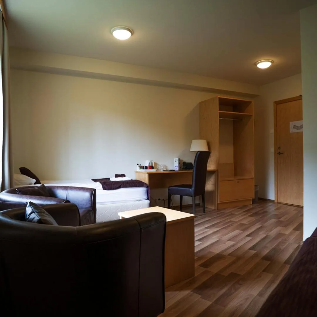 Seating area, Bed in Hotel Hallormsstadur