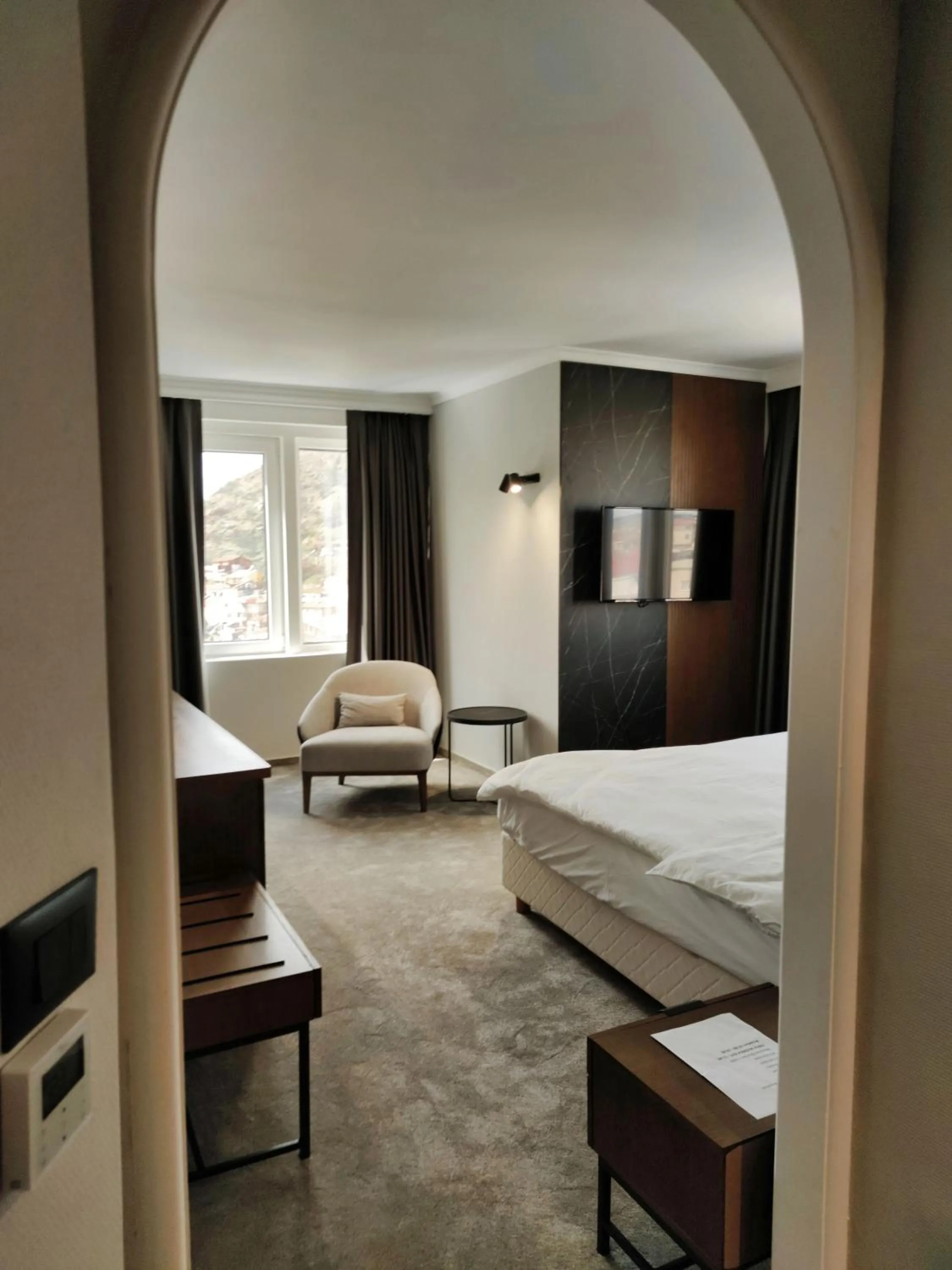 Communal lounge/ TV room, Bed in Oaza Hotel