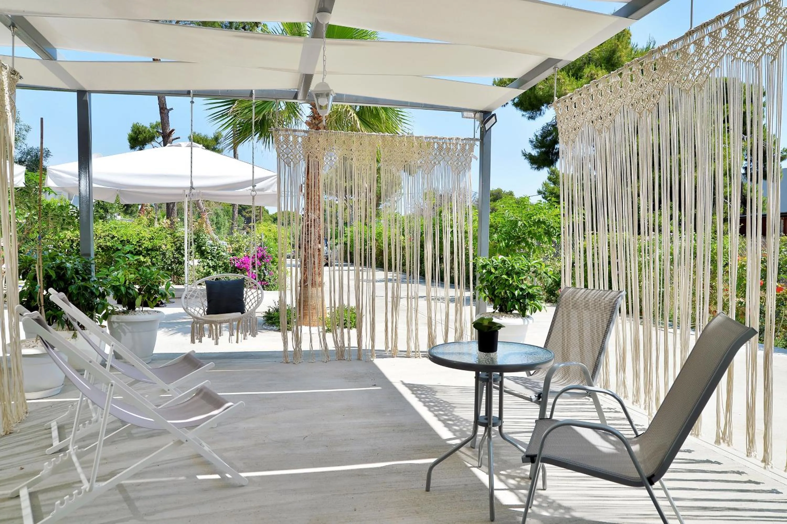 Patio in Alekos Luxury Suites - Free 24hr Transformation From To Airport