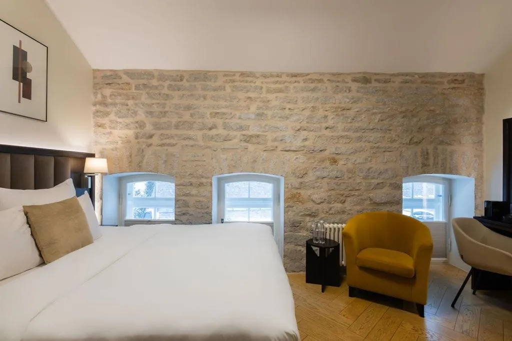 Bed in Nunne Boutique Hotel