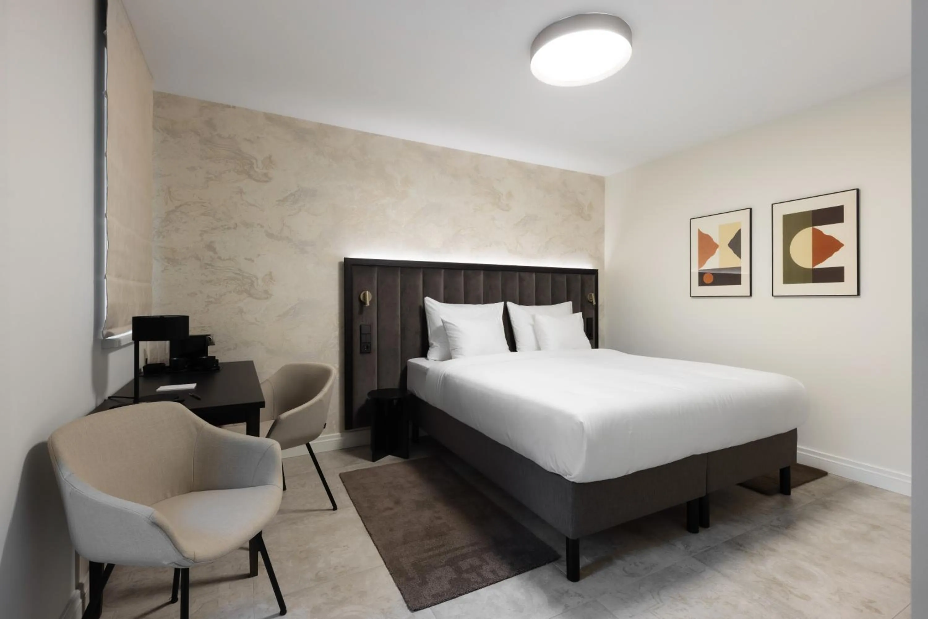 Bed in Nunne Boutique Hotel