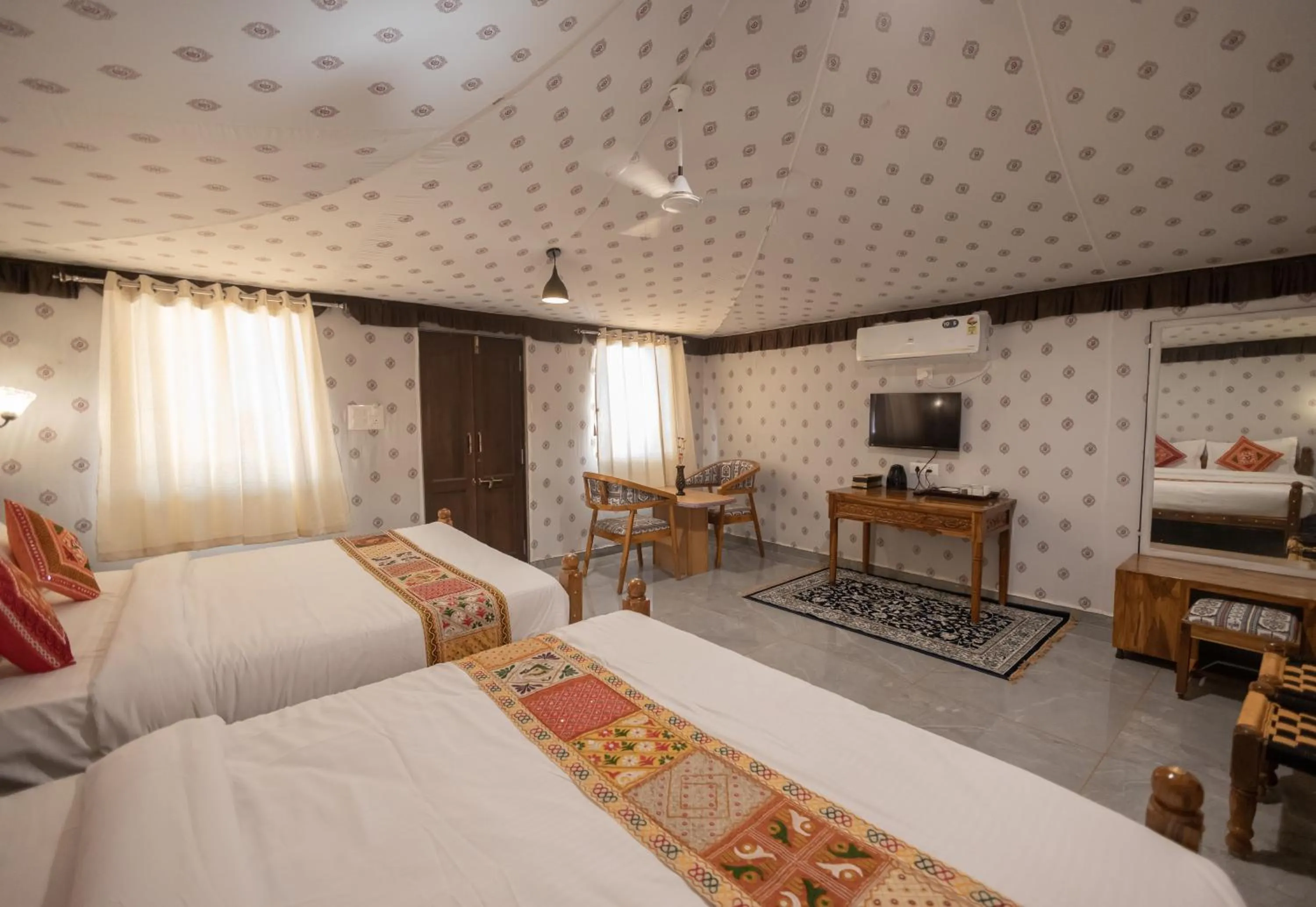 Bed in Vasant Vihar Resort