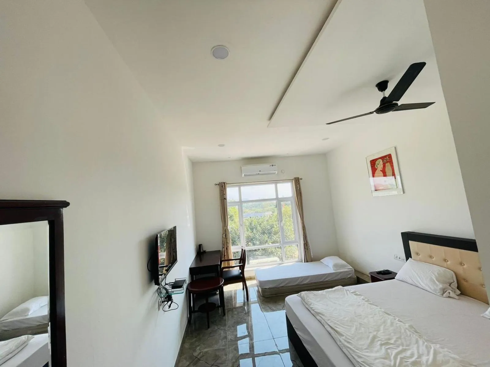 Bed in Vasant Vihar Resort