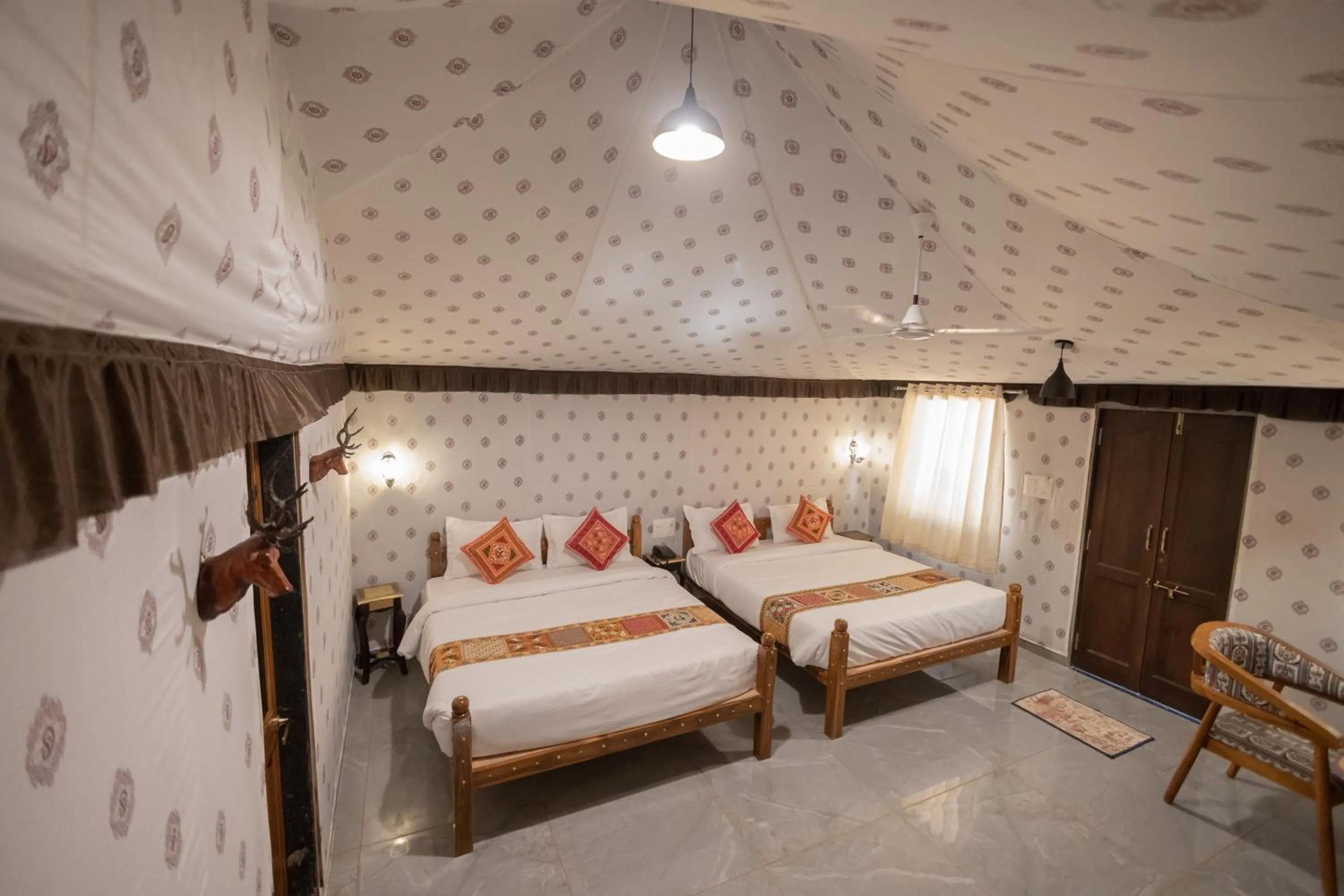Bed in Vasant Vihar Resort