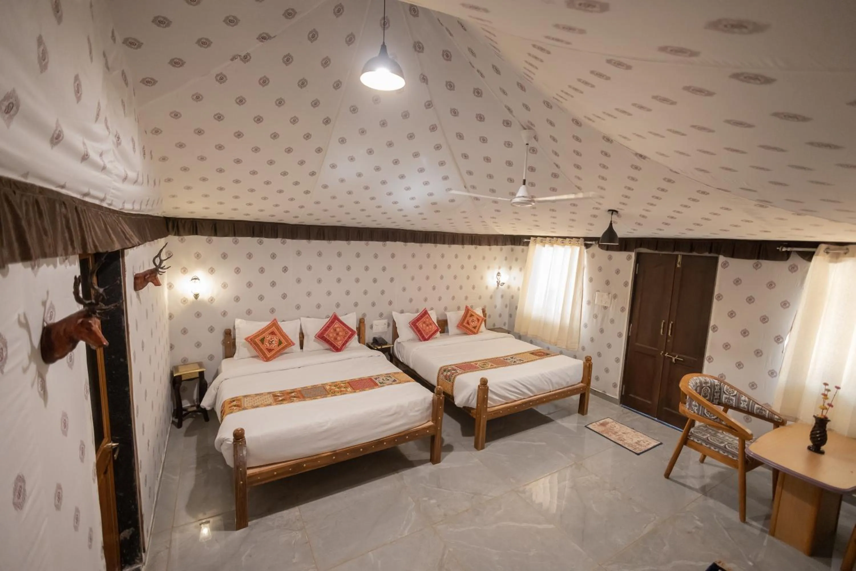 Bed in Vasant Vihar Resort