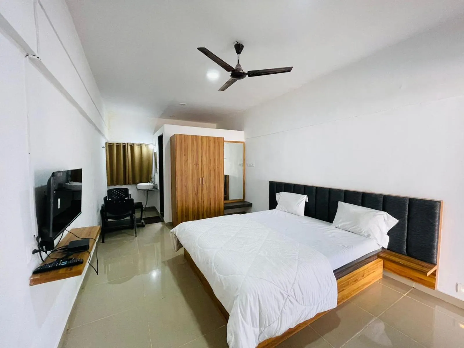 Bed in Vasant Vihar Resort