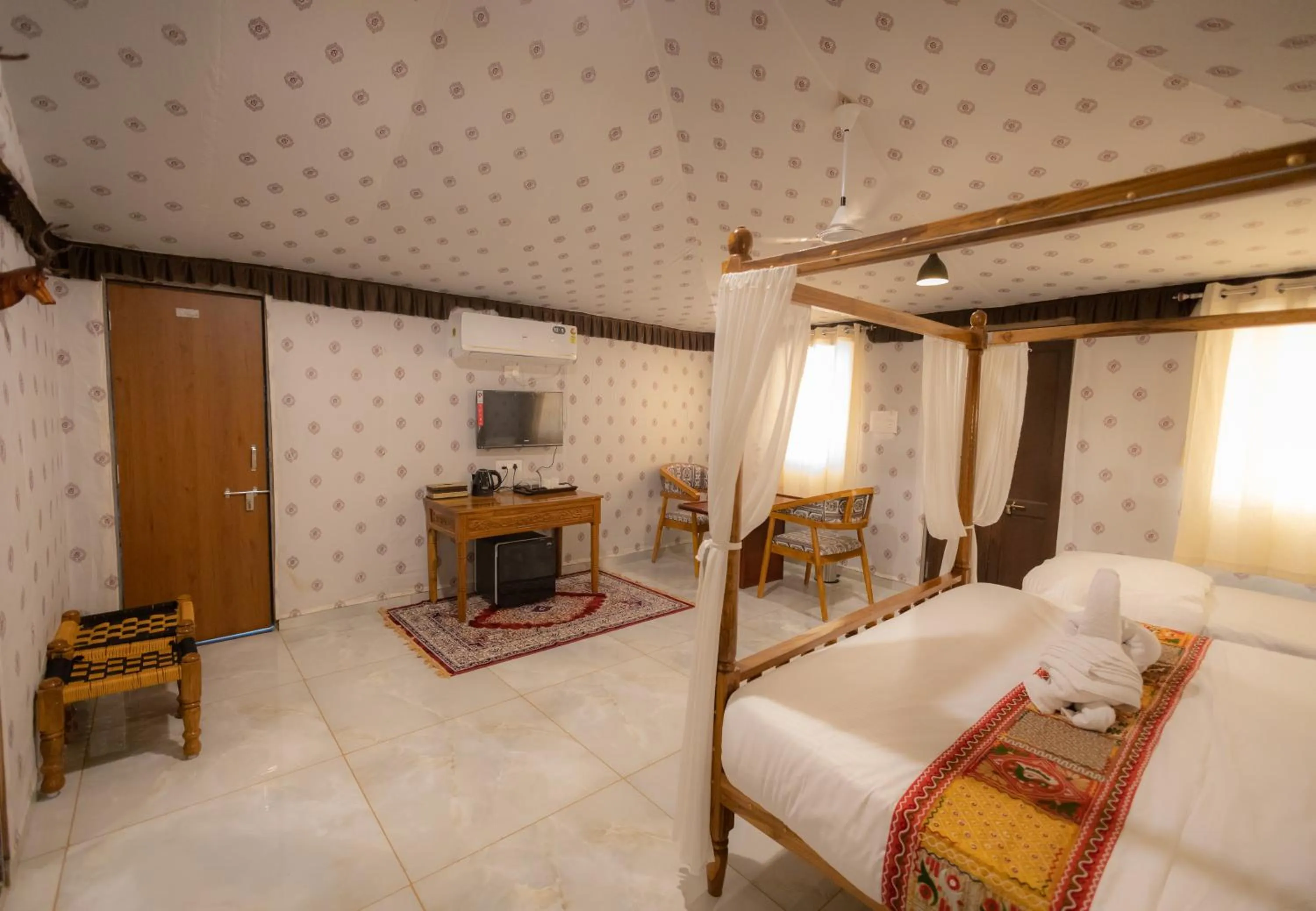 Bed in Vasant Vihar Resort