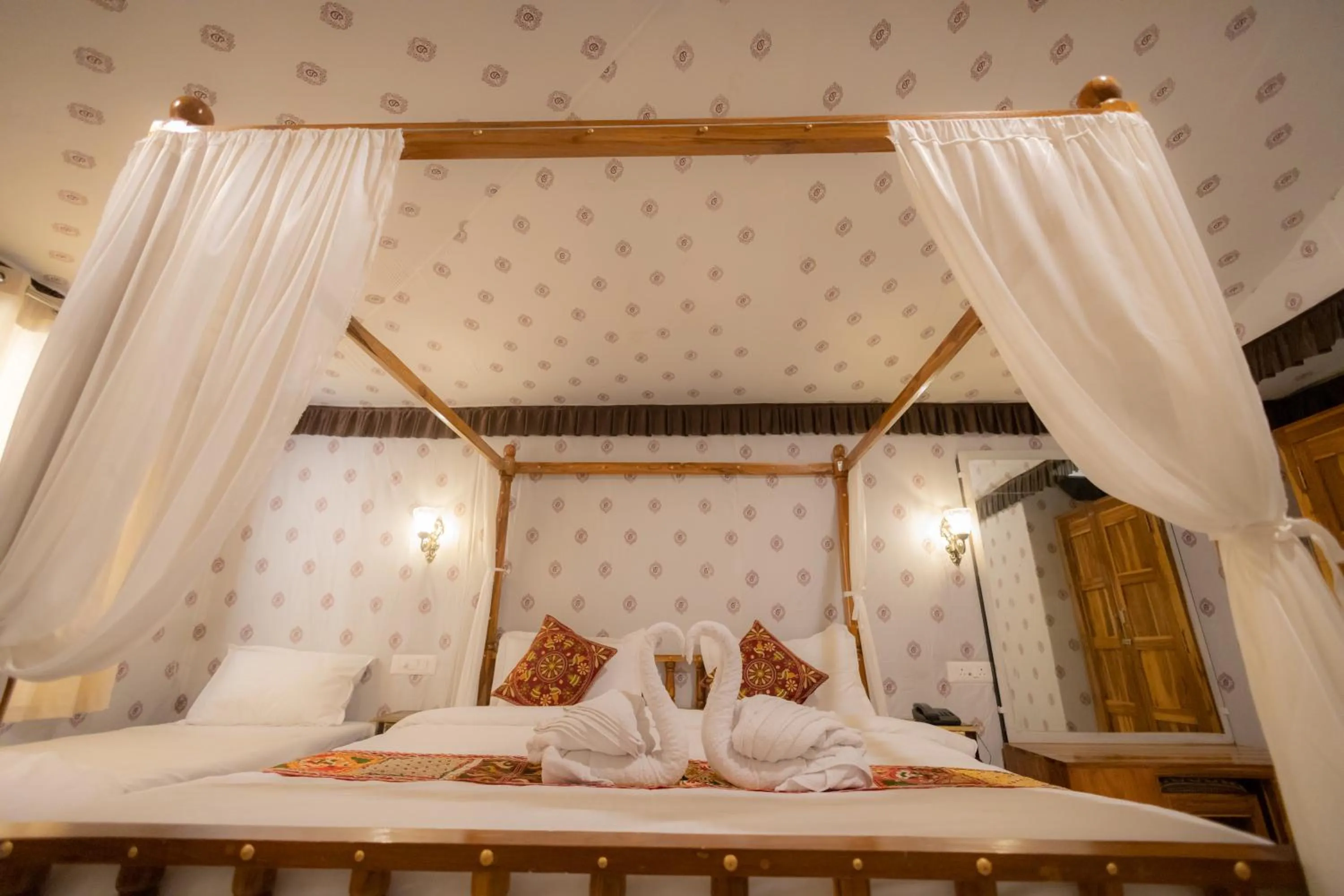 Bed in Vasant Vihar Resort