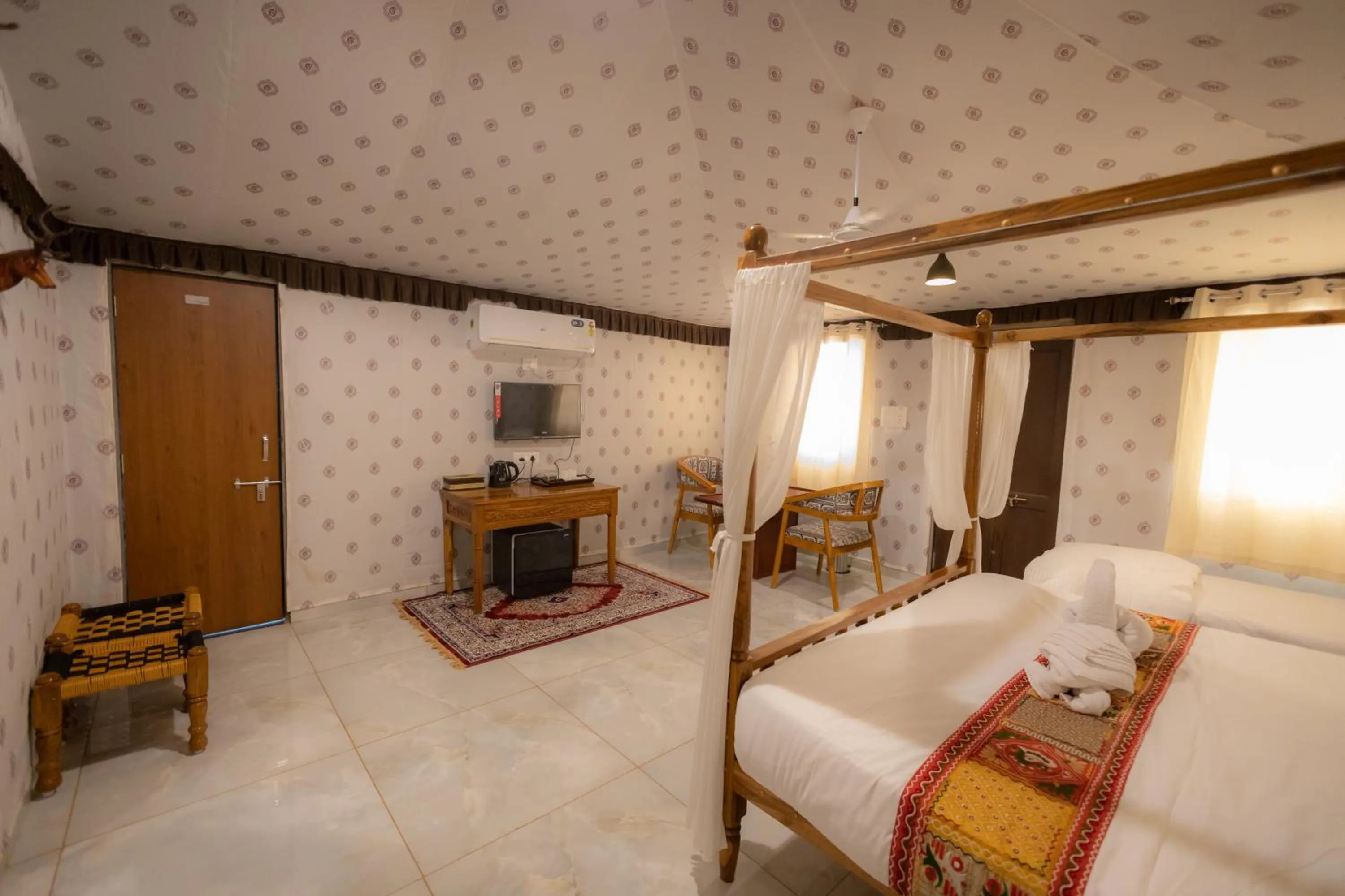Bed in Vasant Vihar Resort