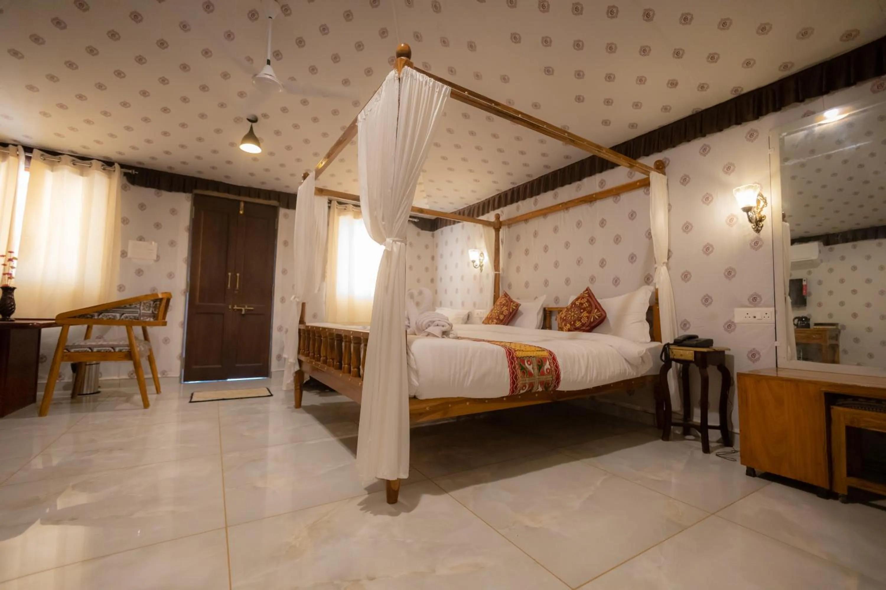 Bed in Vasant Vihar Resort