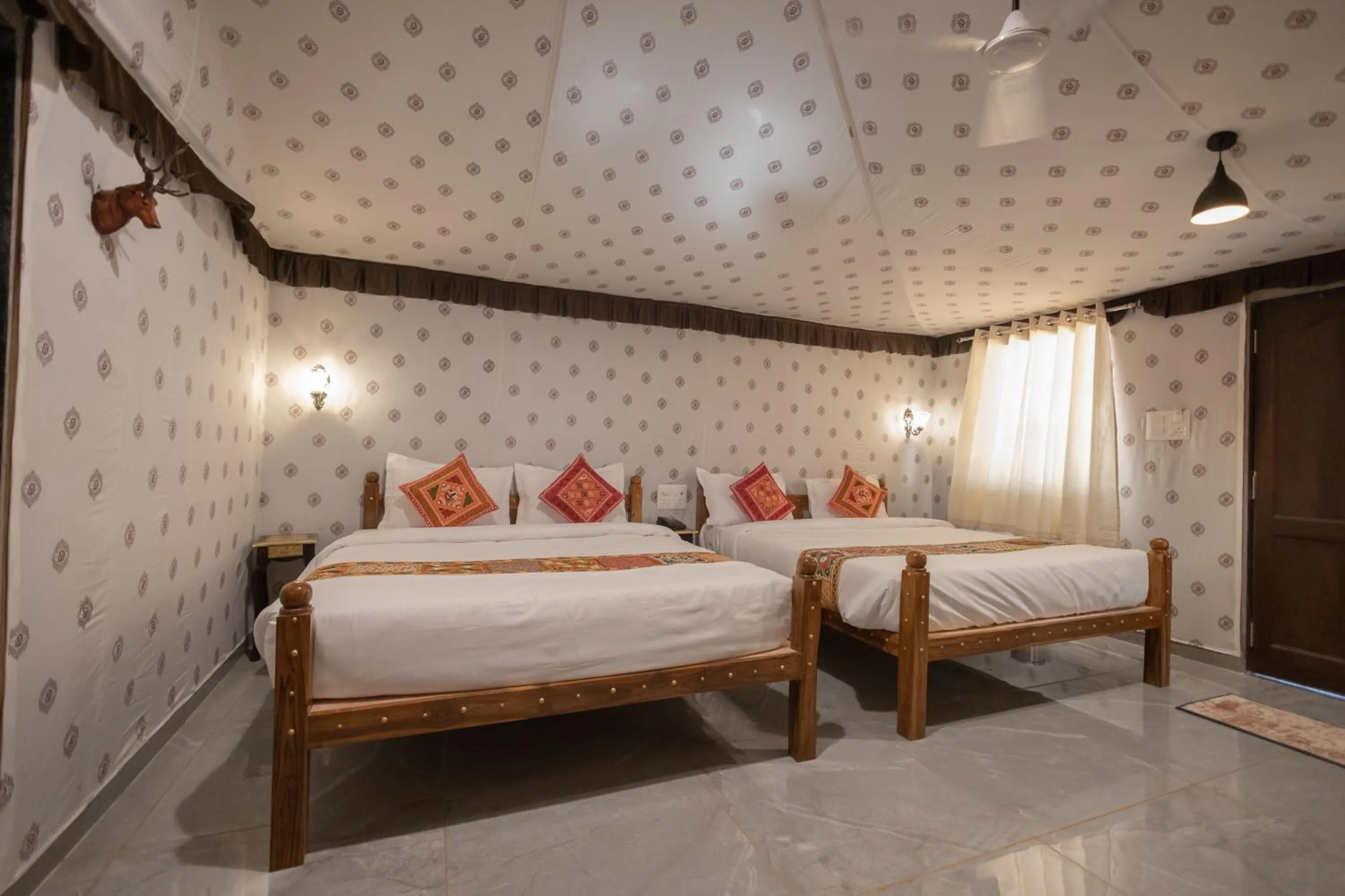 Bed in Vasant Vihar Resort