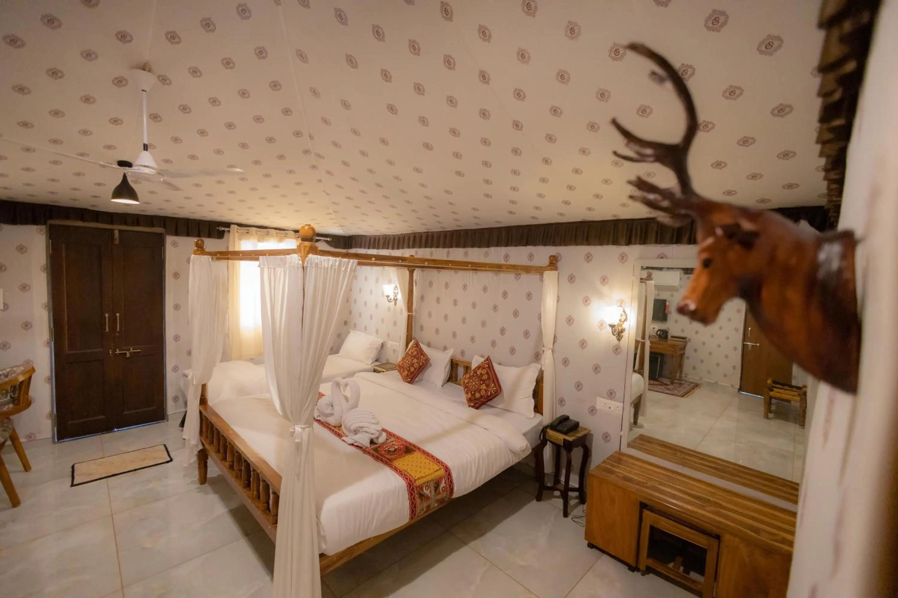 Bed in Vasant Vihar Resort