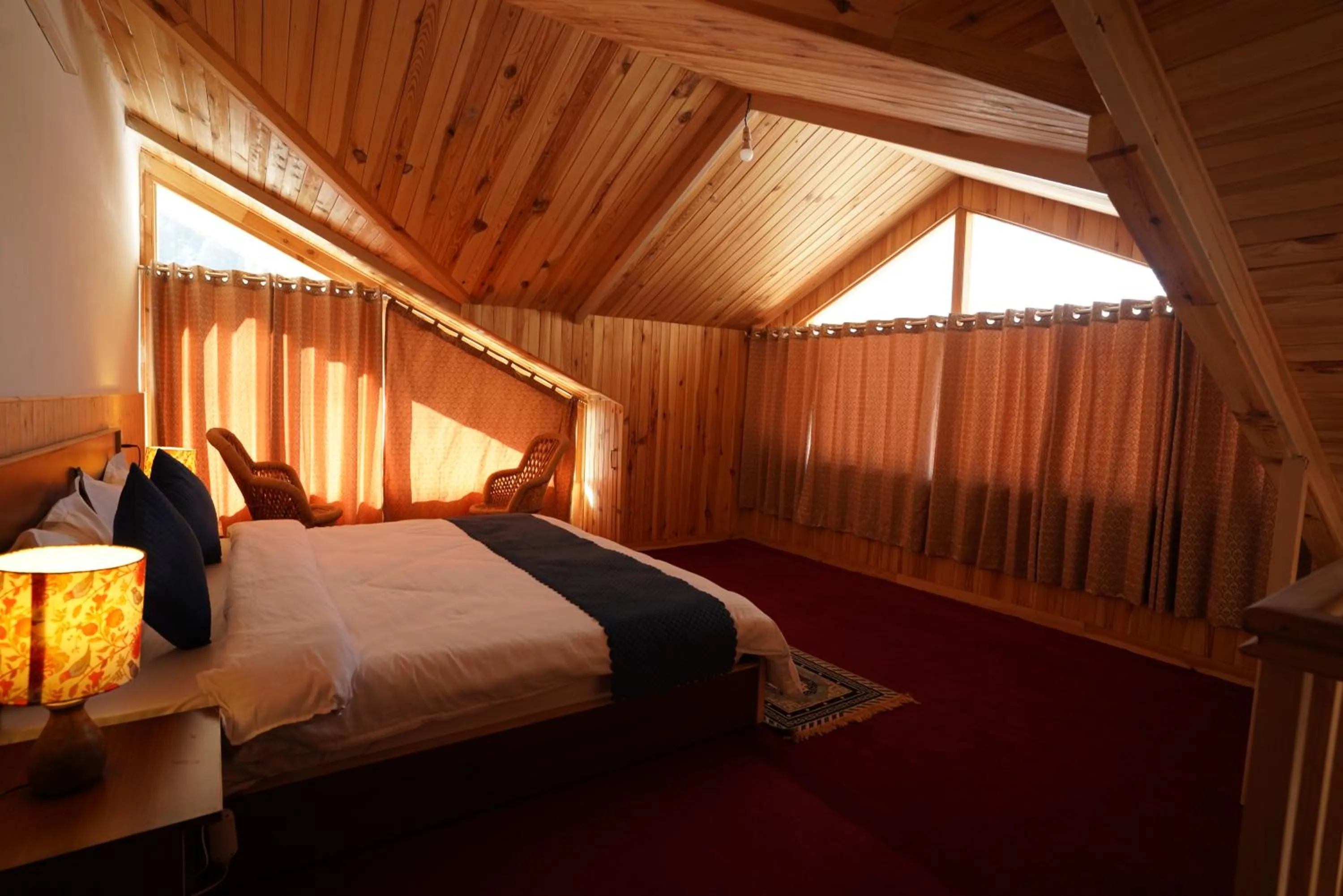 Photo of the whole room, Bed in The Kamru Riverside Camps and Resorts