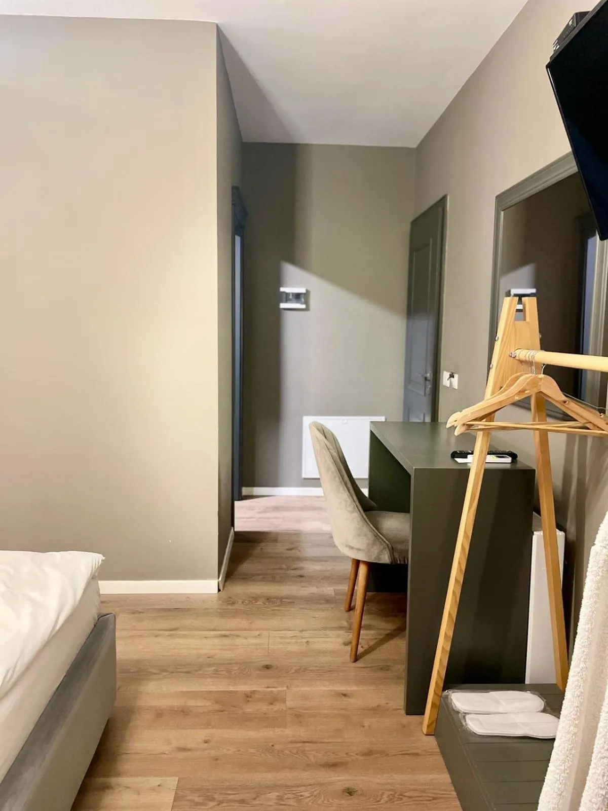 Bed in GRAND JNK Boutique Hotel