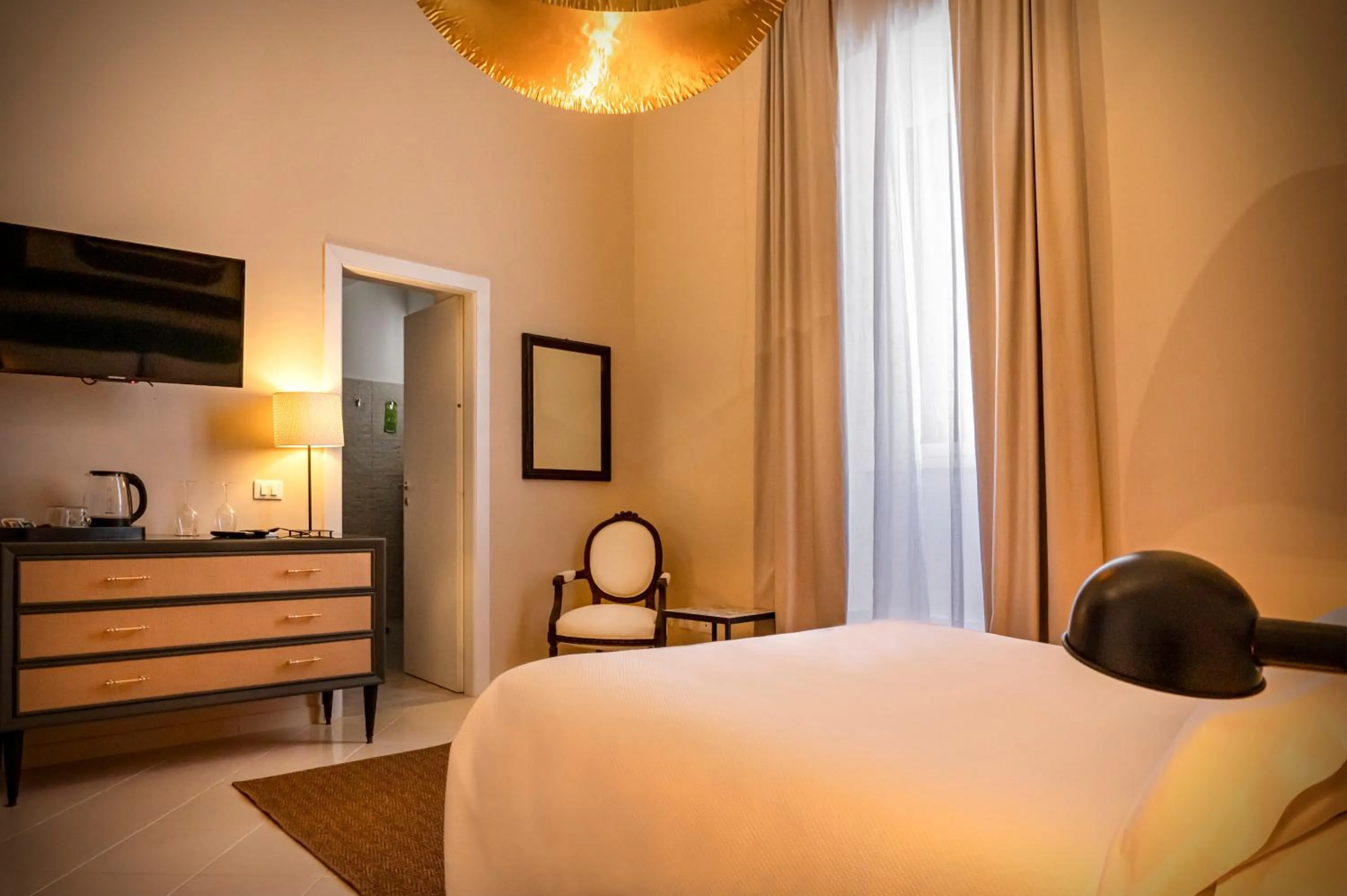 Bed in Aria Rooms and Terrace