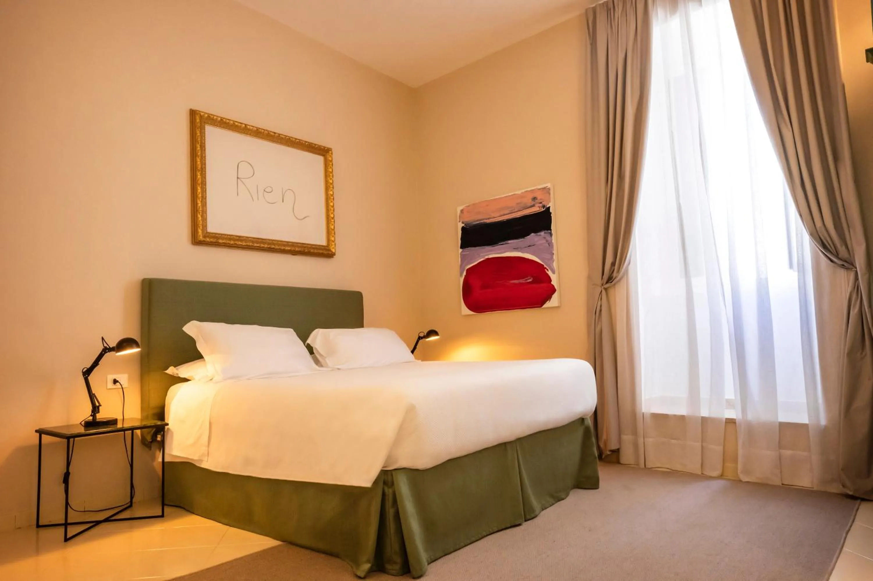 Bed in Aria Rooms and Terrace