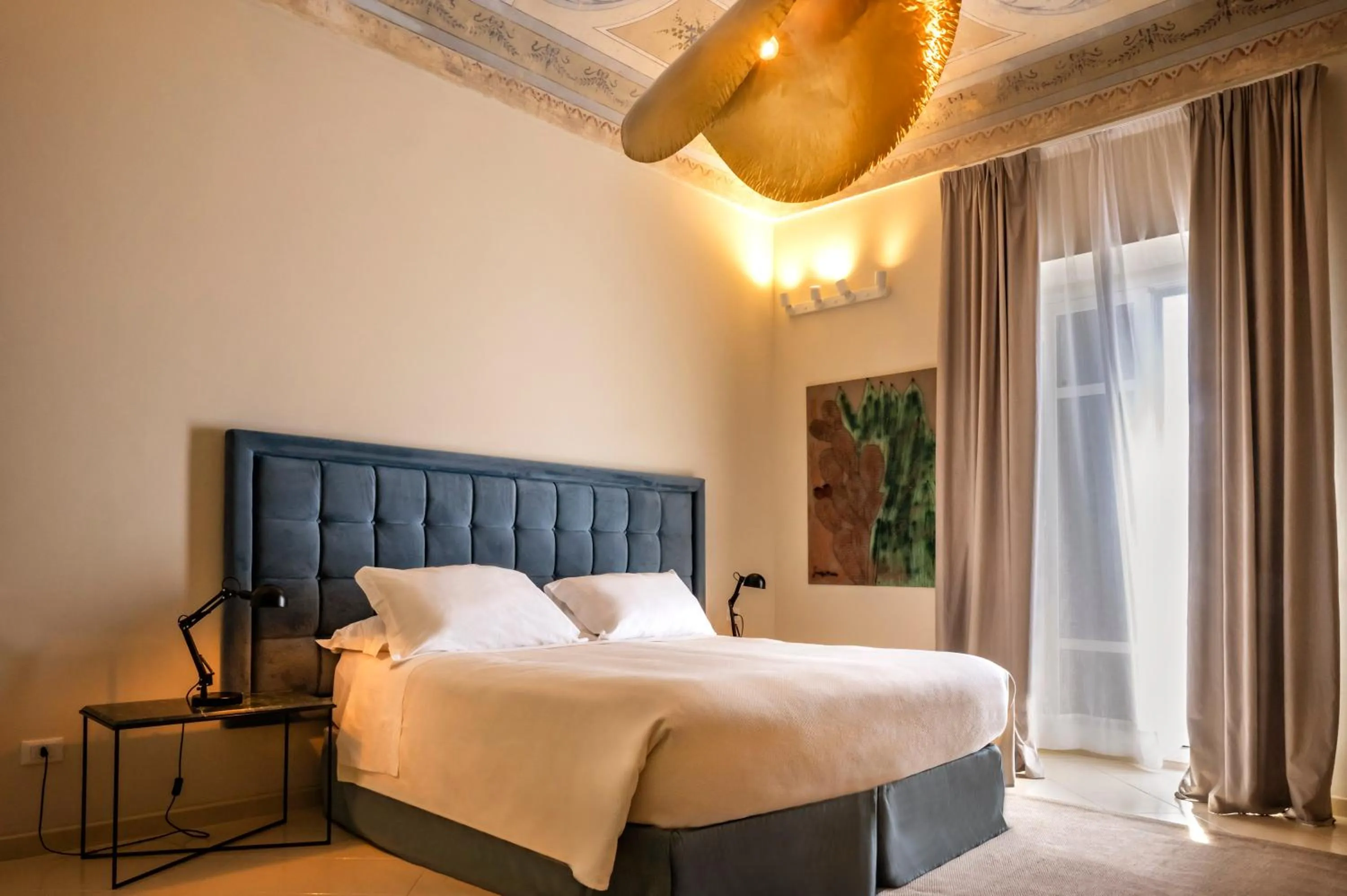 Bed in Aria Rooms and Terrace