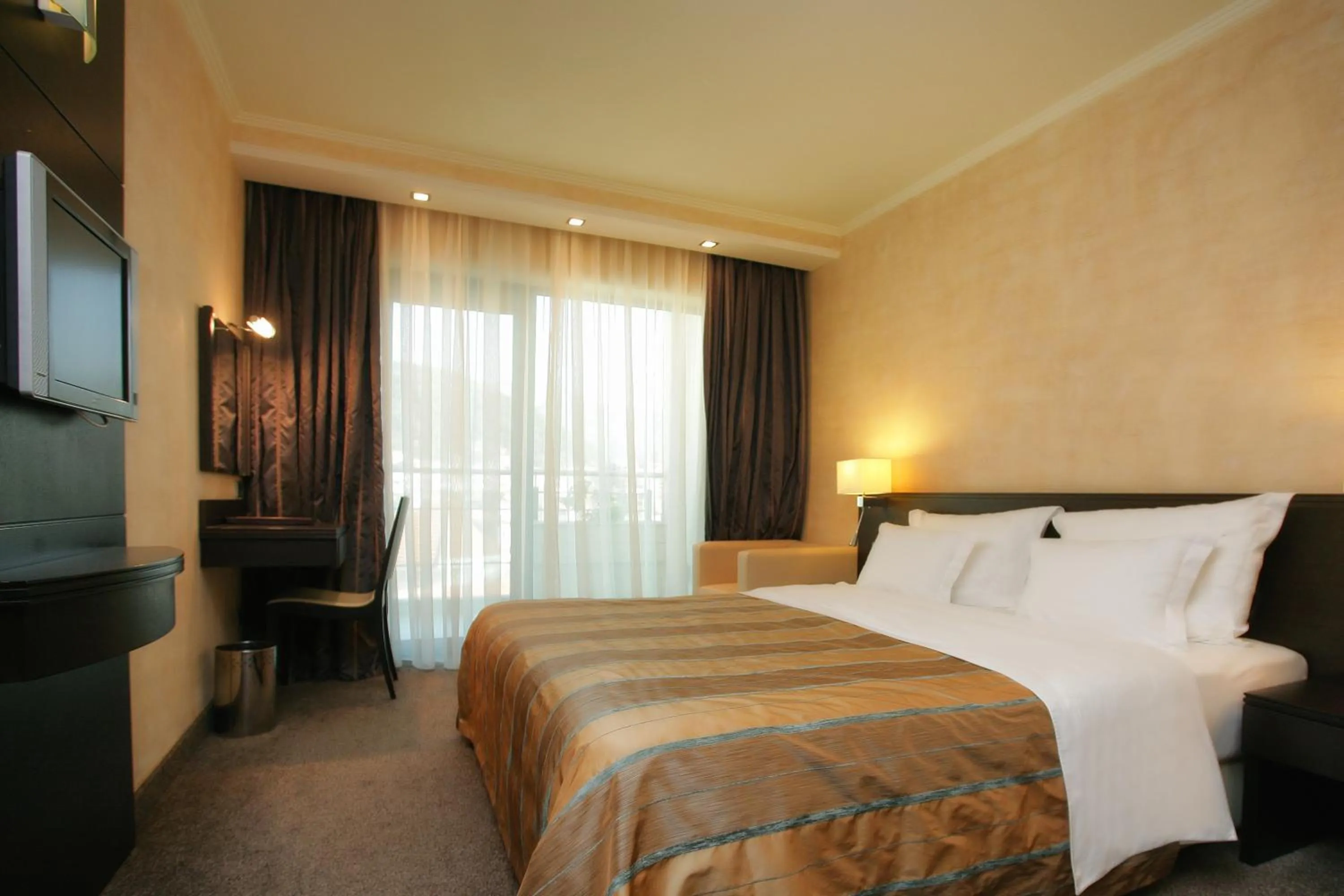 Photo of the whole room, Bed in Monte Casa SPA & Wellness