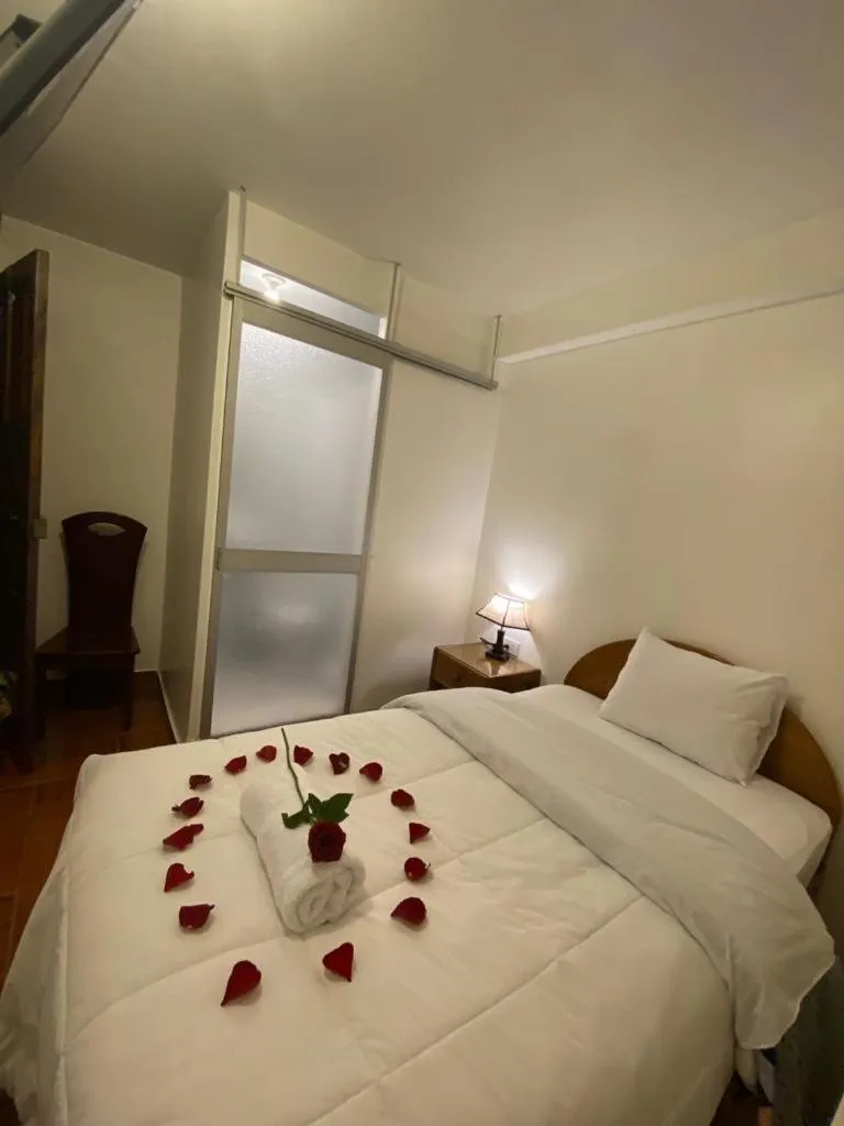 Bed in Inka House Hotel