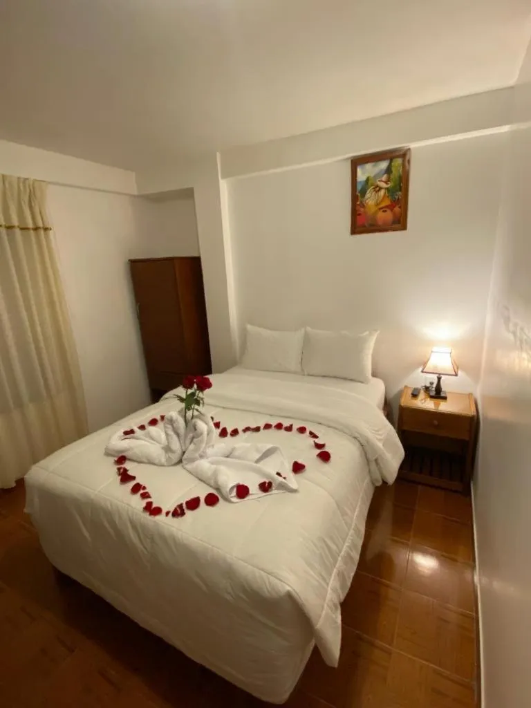 Bed in Inka House Hotel