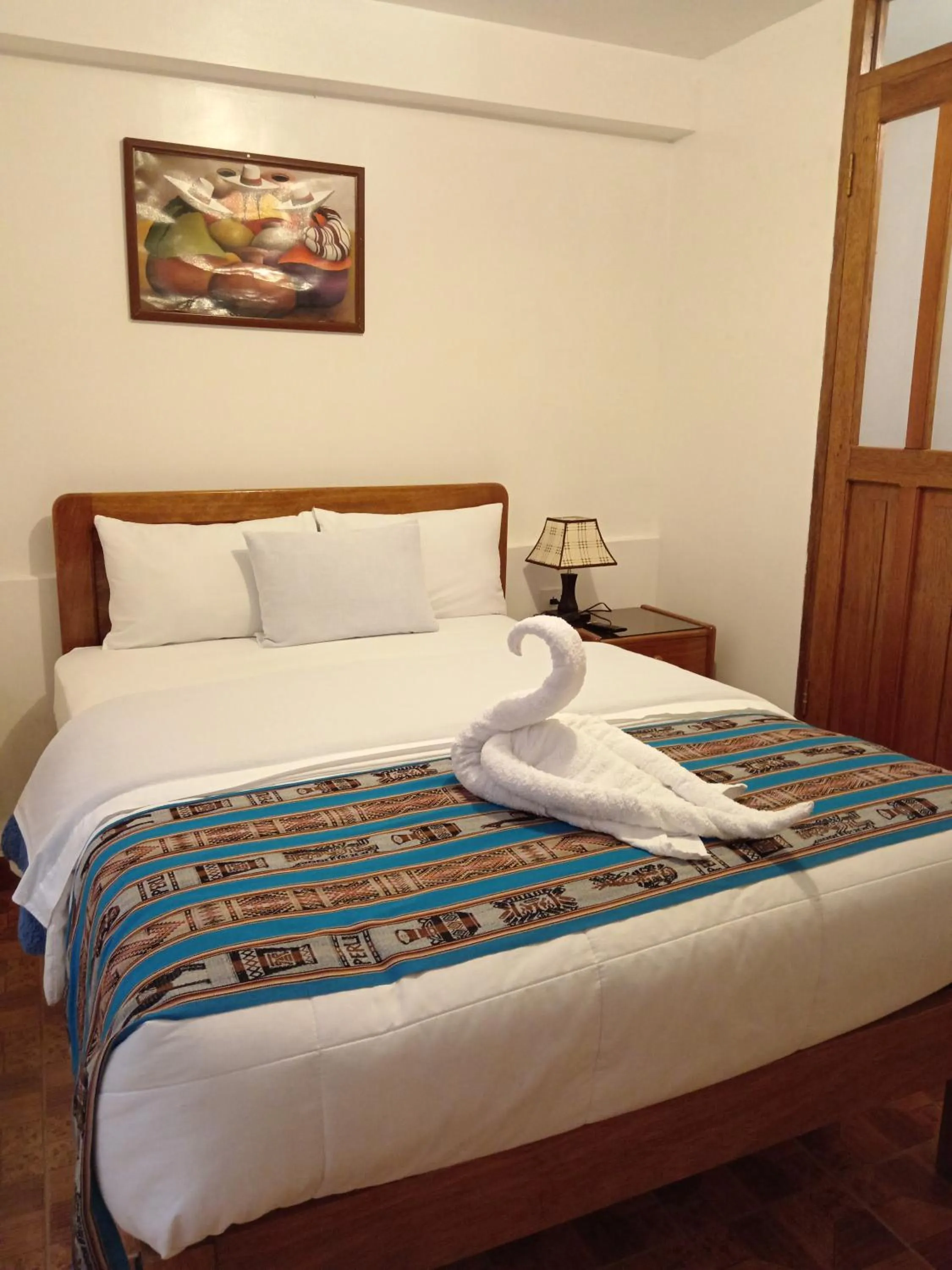 Bed in Inka House Hotel