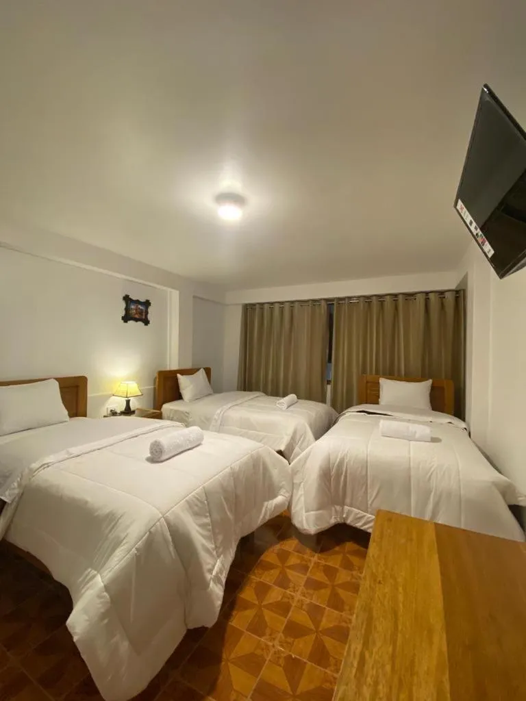 Bed in Inka House Hotel
