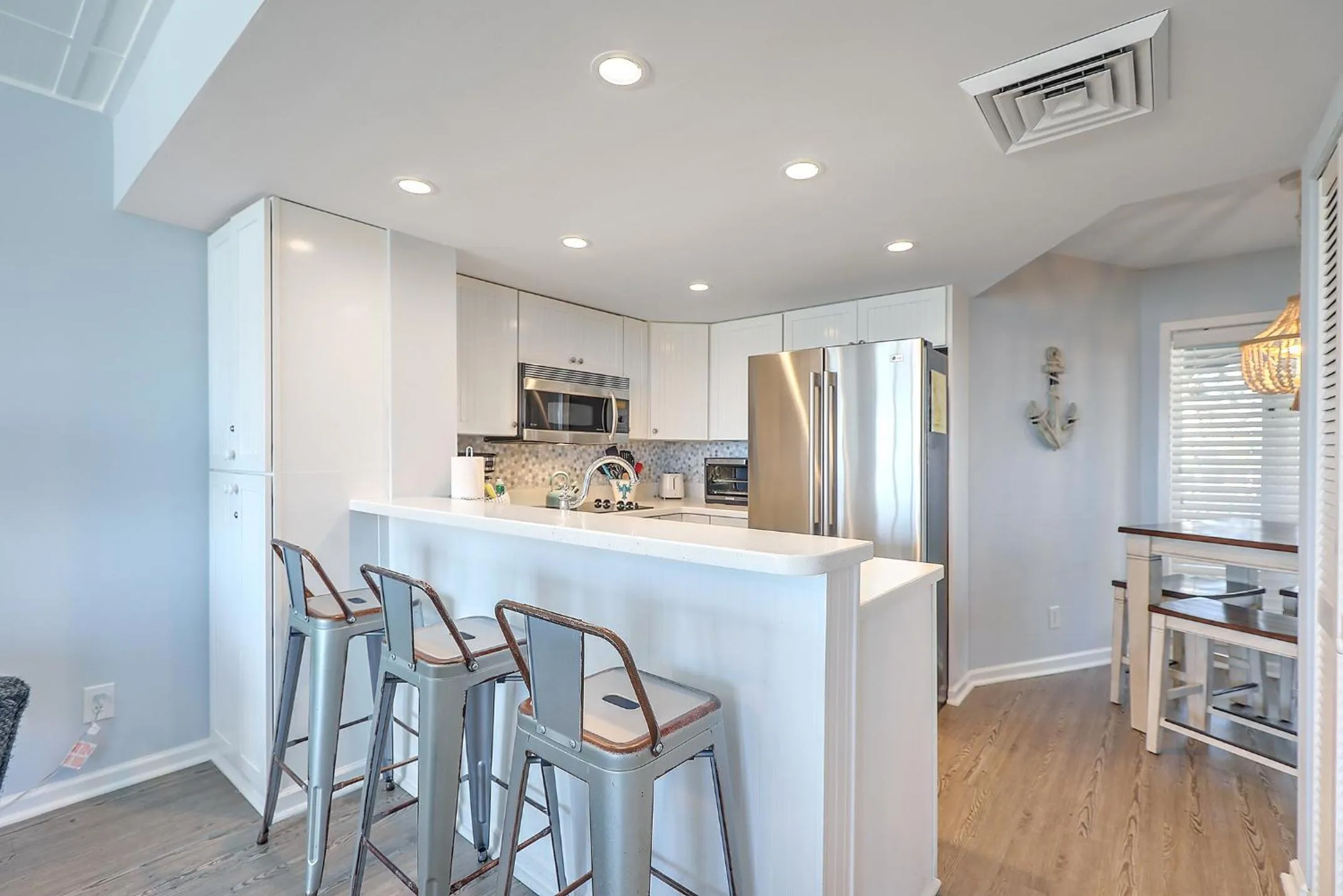 Kitchen or kitchenette in New Listing! Port O' Call B103 - Oceanfront Oasis!