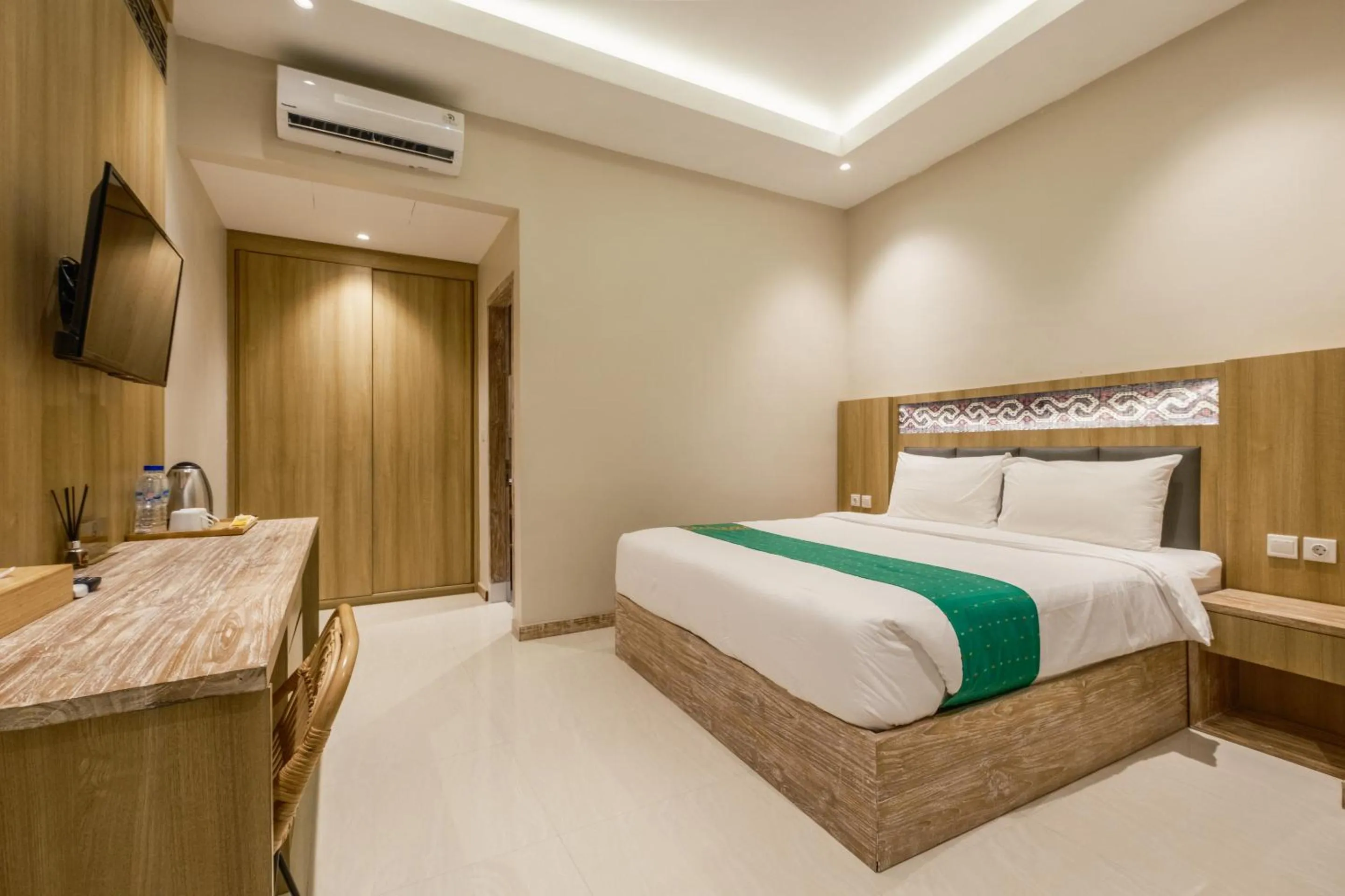 Bed in DEJAVU 2.0 HOTEL BAJO KOMODO