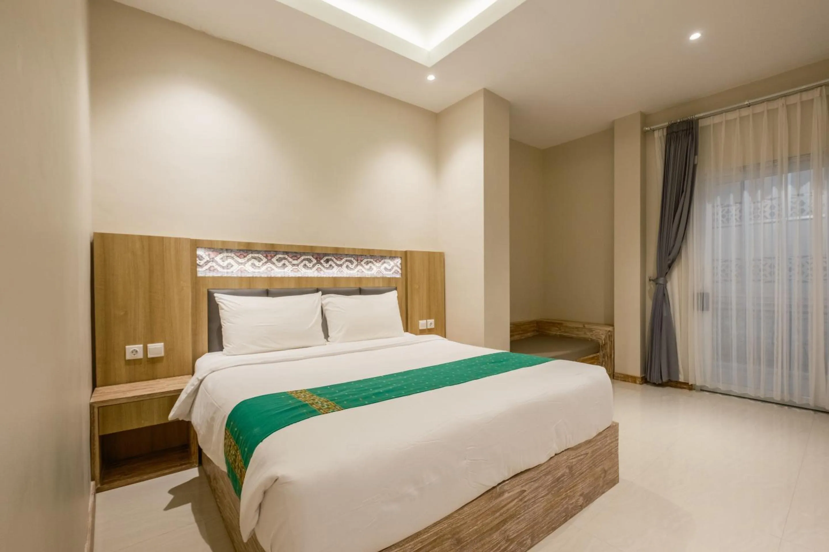 Bed in DEJAVU 2.0 HOTEL BAJO KOMODO