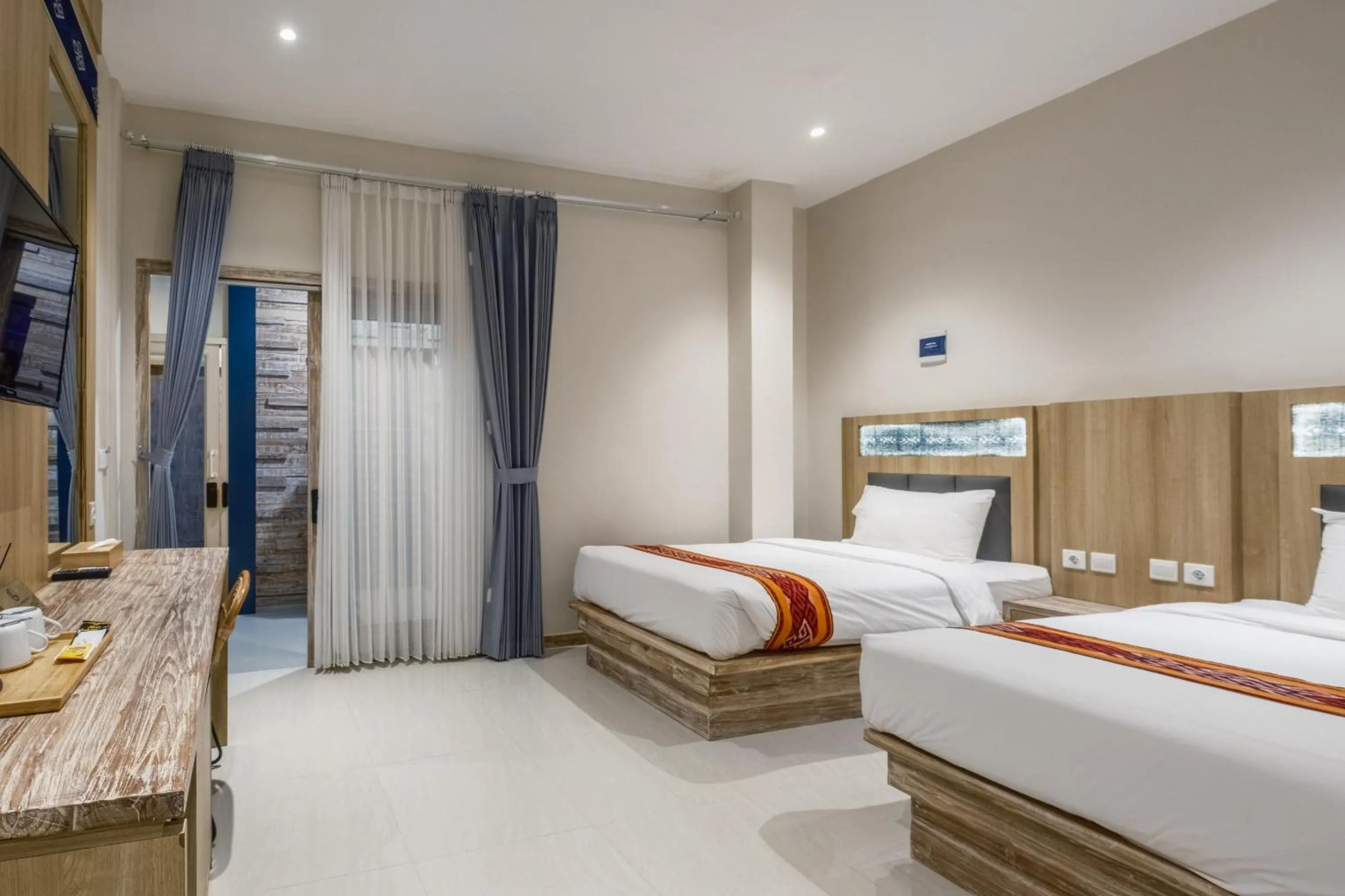 Bed in DEJAVU 2.0 HOTEL BAJO KOMODO